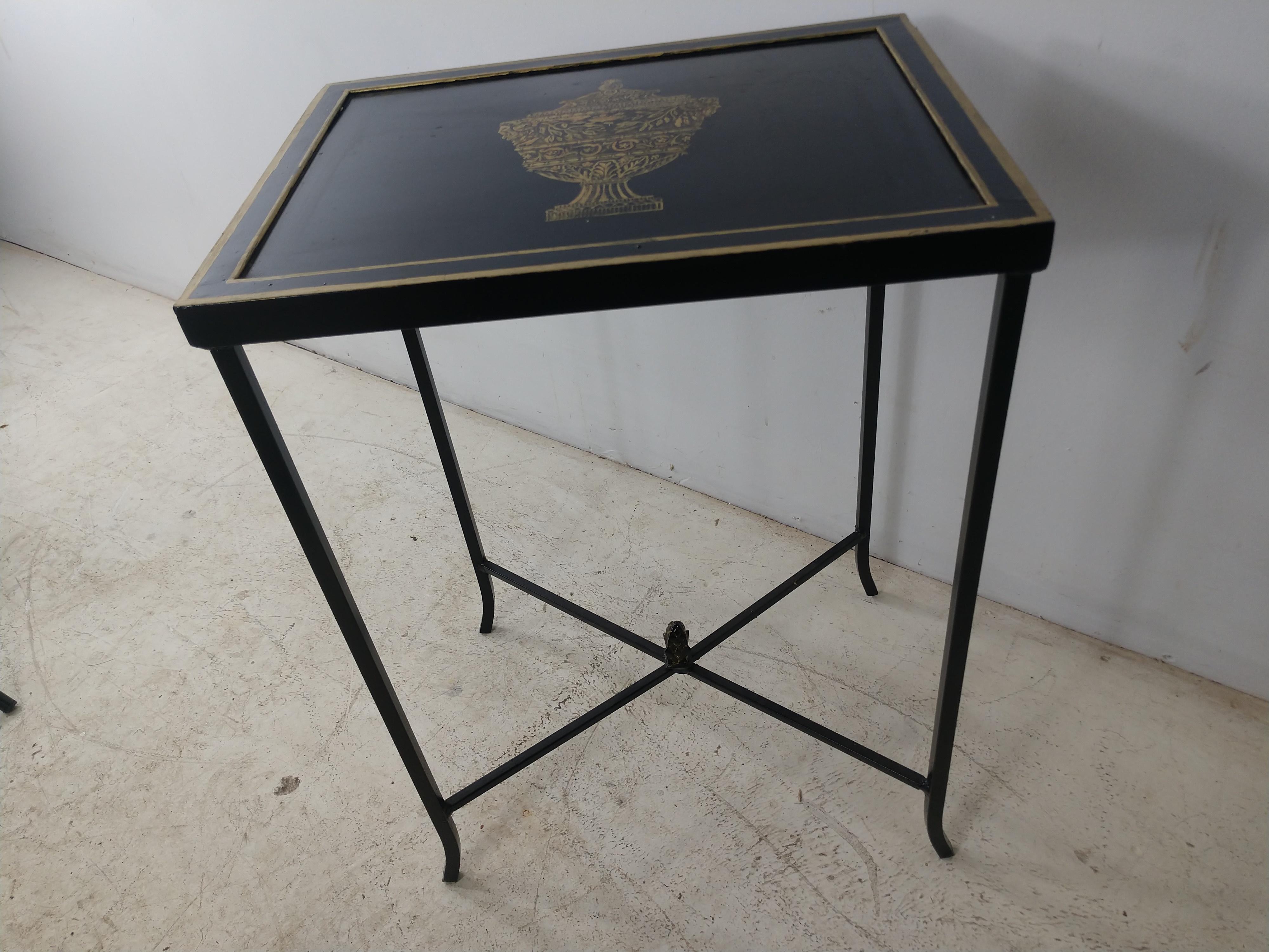 Simple and elegant toleware side table in black with gilt decorations. X-stretcher with acorn finial. This item can be parcel posted.