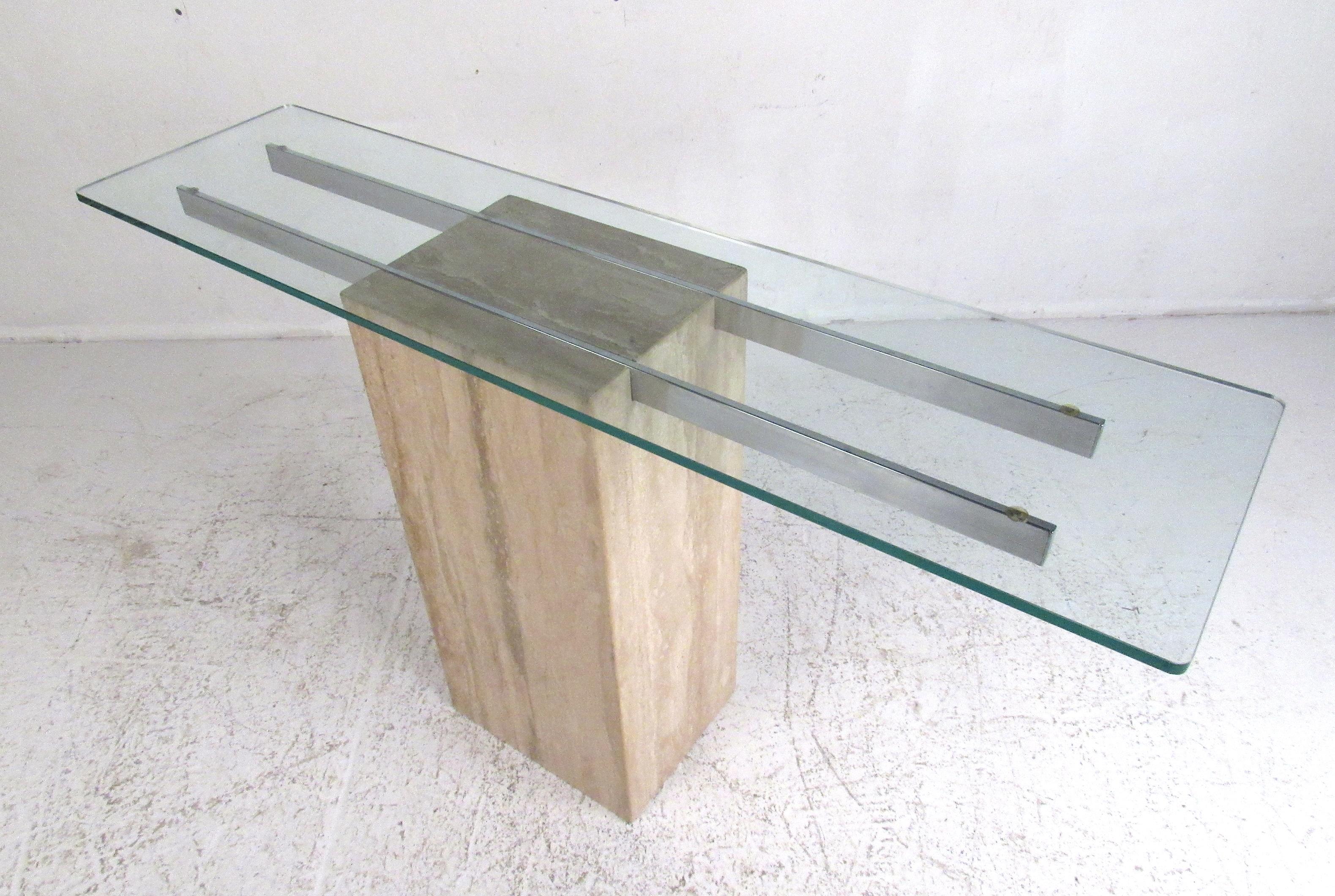 Elegant Italian travertine console table with beveled glass top supported by brass plated bars. Please confirm item location (NY or NJ) with dealer.
