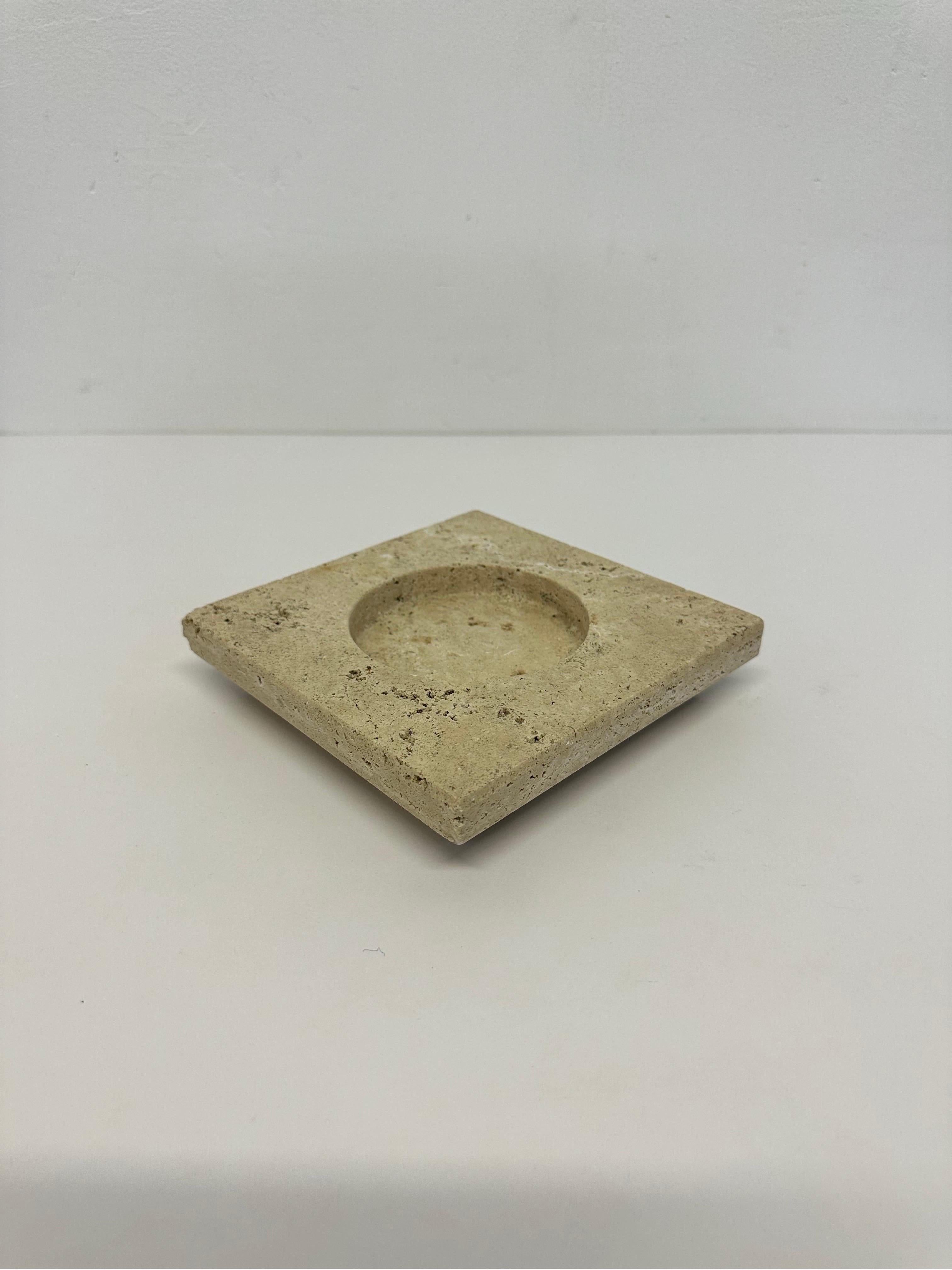 Italian travertine ash tray or catchall circa 1970s.  The bottom of travertine has a suede table top protector.