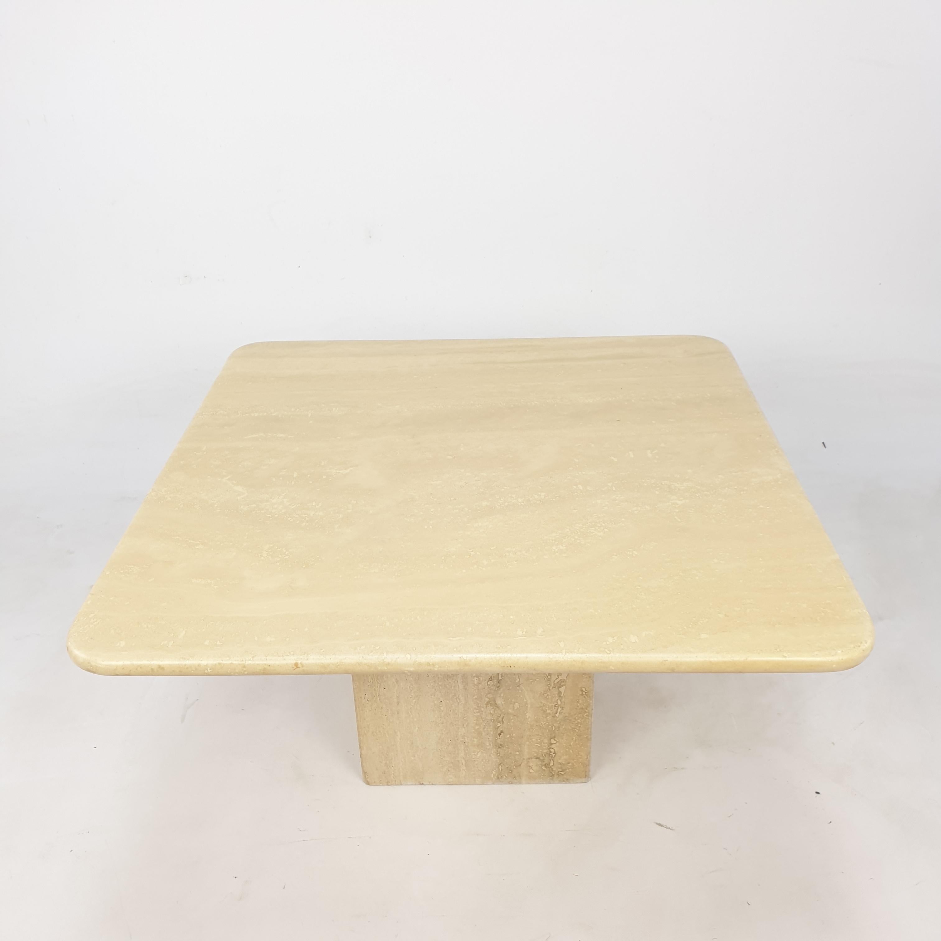 Very nice Italian coffee table from the 80's, handcrafted out of travertine. The top is rounded on the edge. This stunning table will make the perfect addition to any seating or living room decor for years to come.