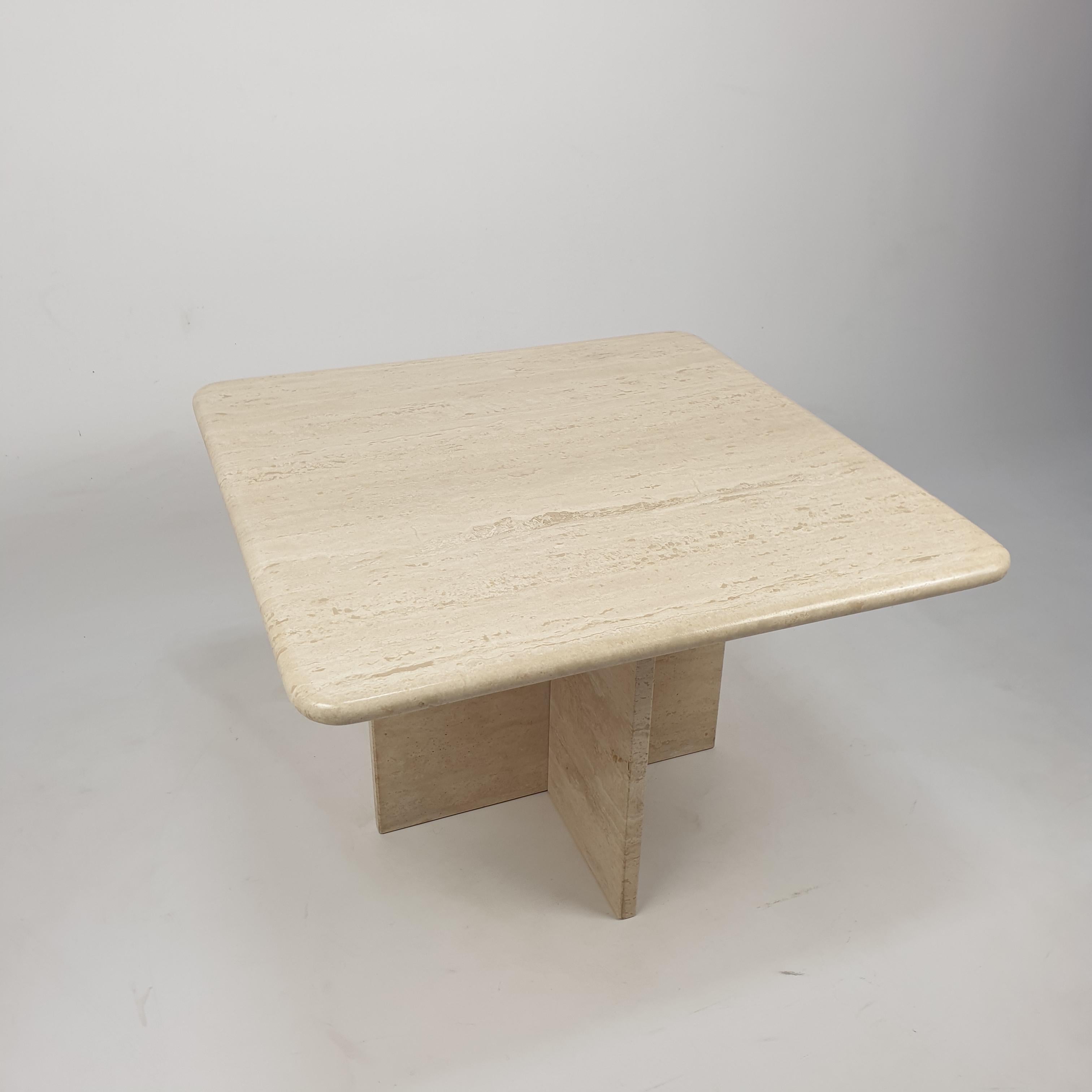 Very nice Italian coffee table from the 80's, handcrafted out of travertine. The top is rounded on the edge. This stunning table will make the perfect addition to any seating or living room decor for years to come.