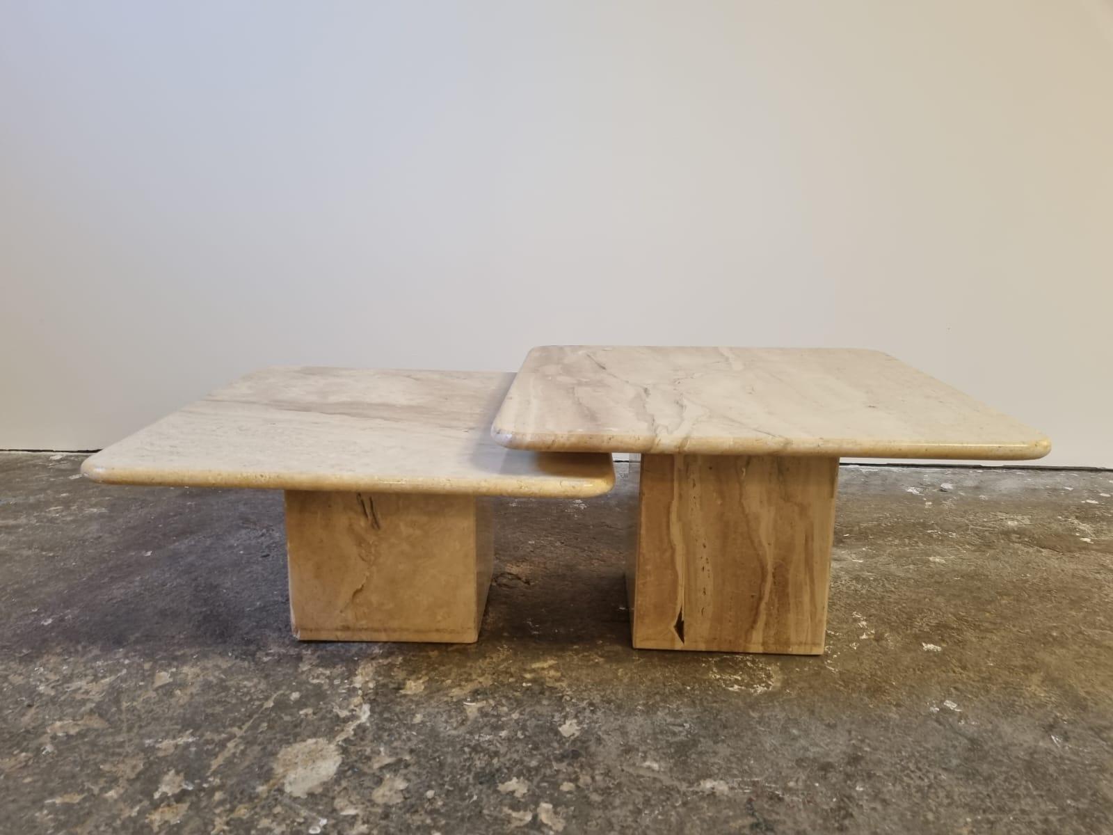 Beautiful pair of Italian designed travertine marble tables, these have a variety of configurations possible, heavy, original period designed, great coffee table set

More pictures and details are available upon request

APROX. DIMENSIONS
Width 60cm