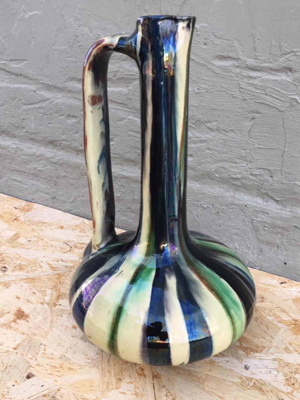 Mid-Century Italian vase, urne o pitcher with a greens iridescents glaze.
     
