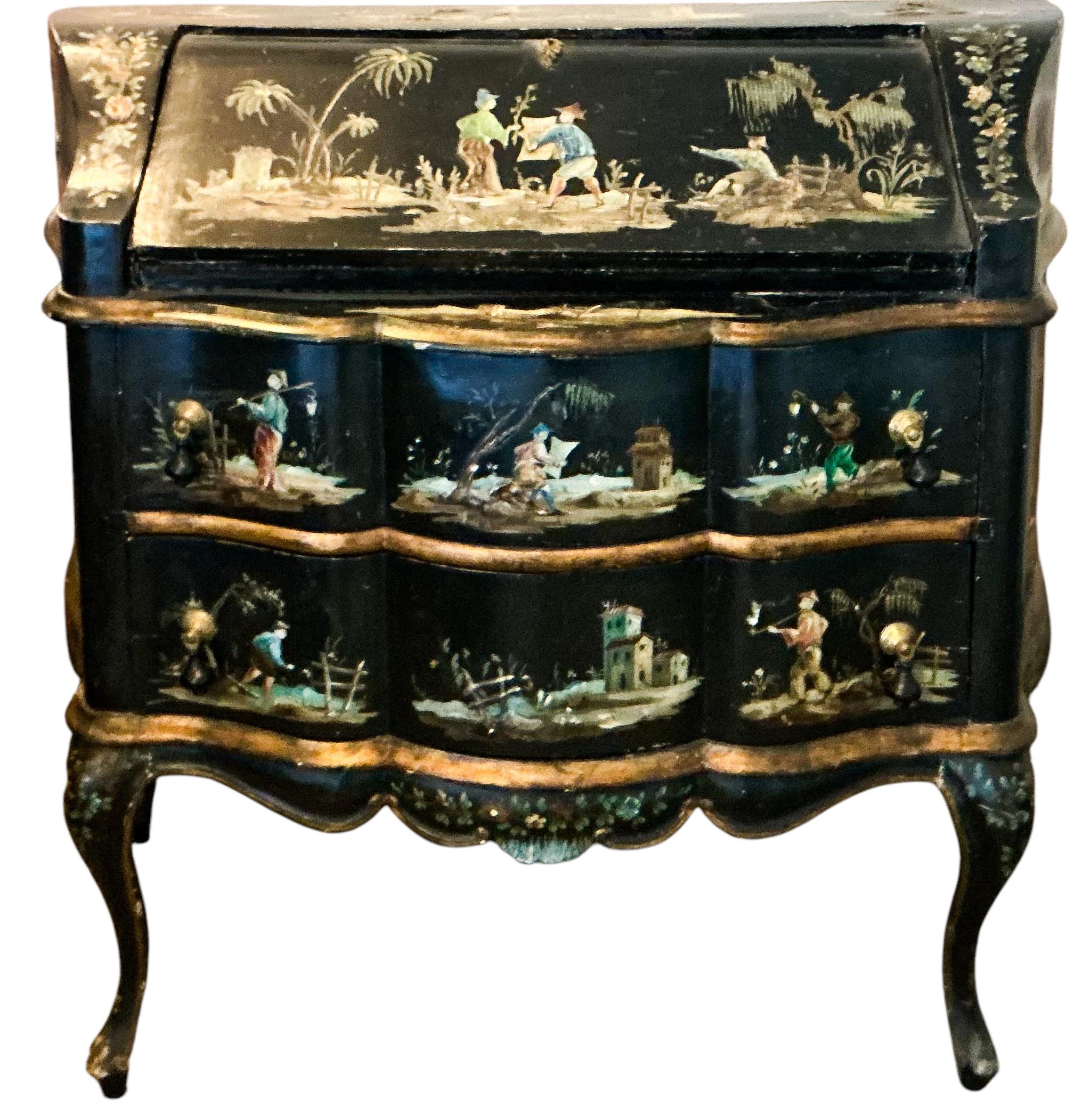 This is a beautiful piece. This is a lovely mid-century Italian chinoiserie secretary desk. The coral and gilt interior makes such a vibrant statement. Each panel of the serpentine front is hand painted pastoral scene. The  down writing surface
