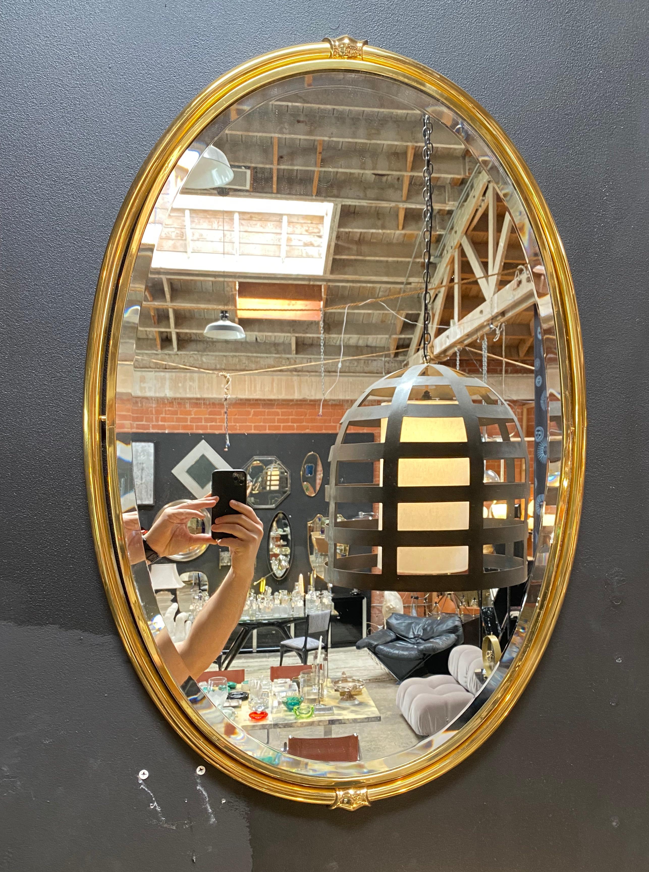 Beautiful vintage Italian wall mirror made with brass frame.
 