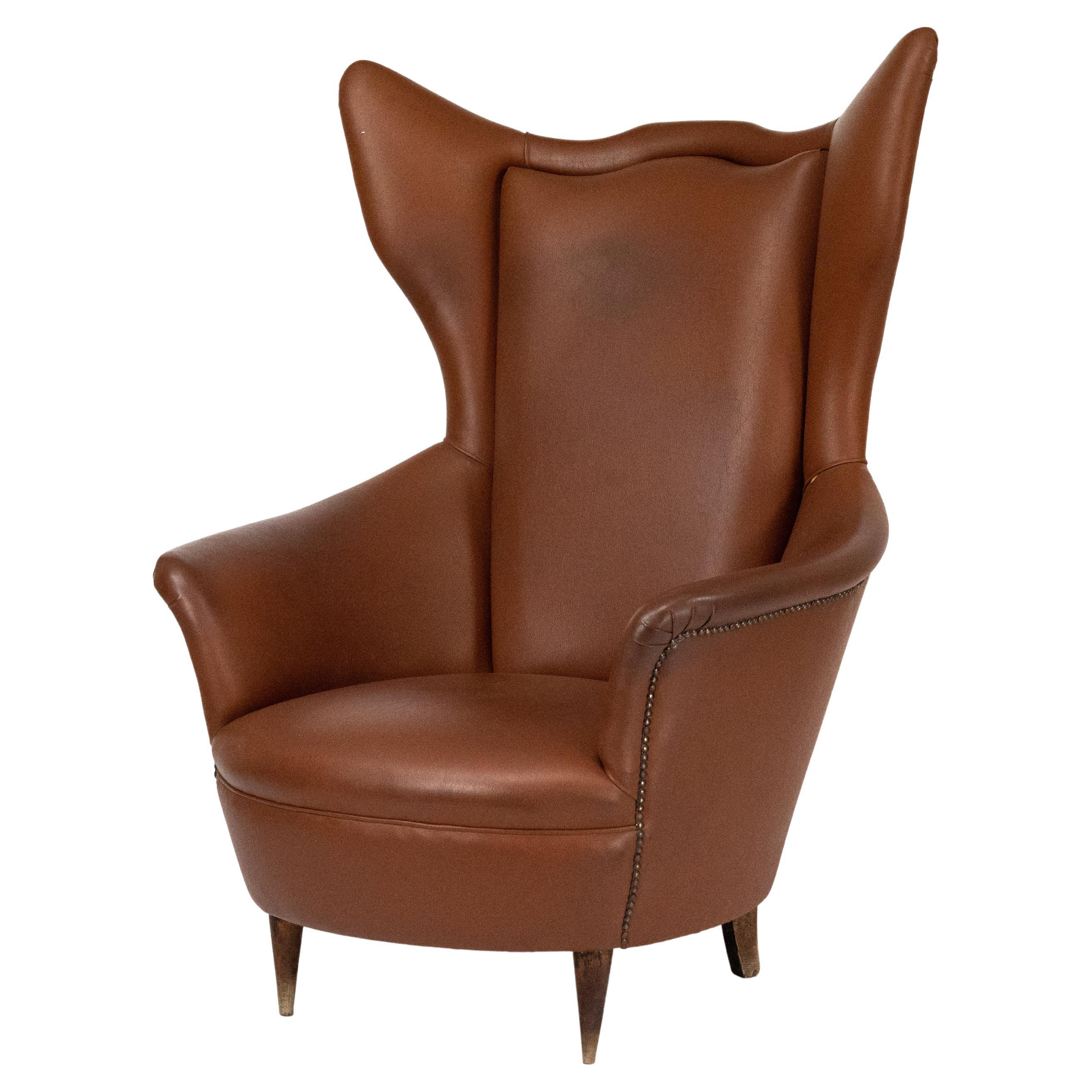 Italienischer Kunstledersessel aus der Jahrhundertmitte, 1950er Jahre