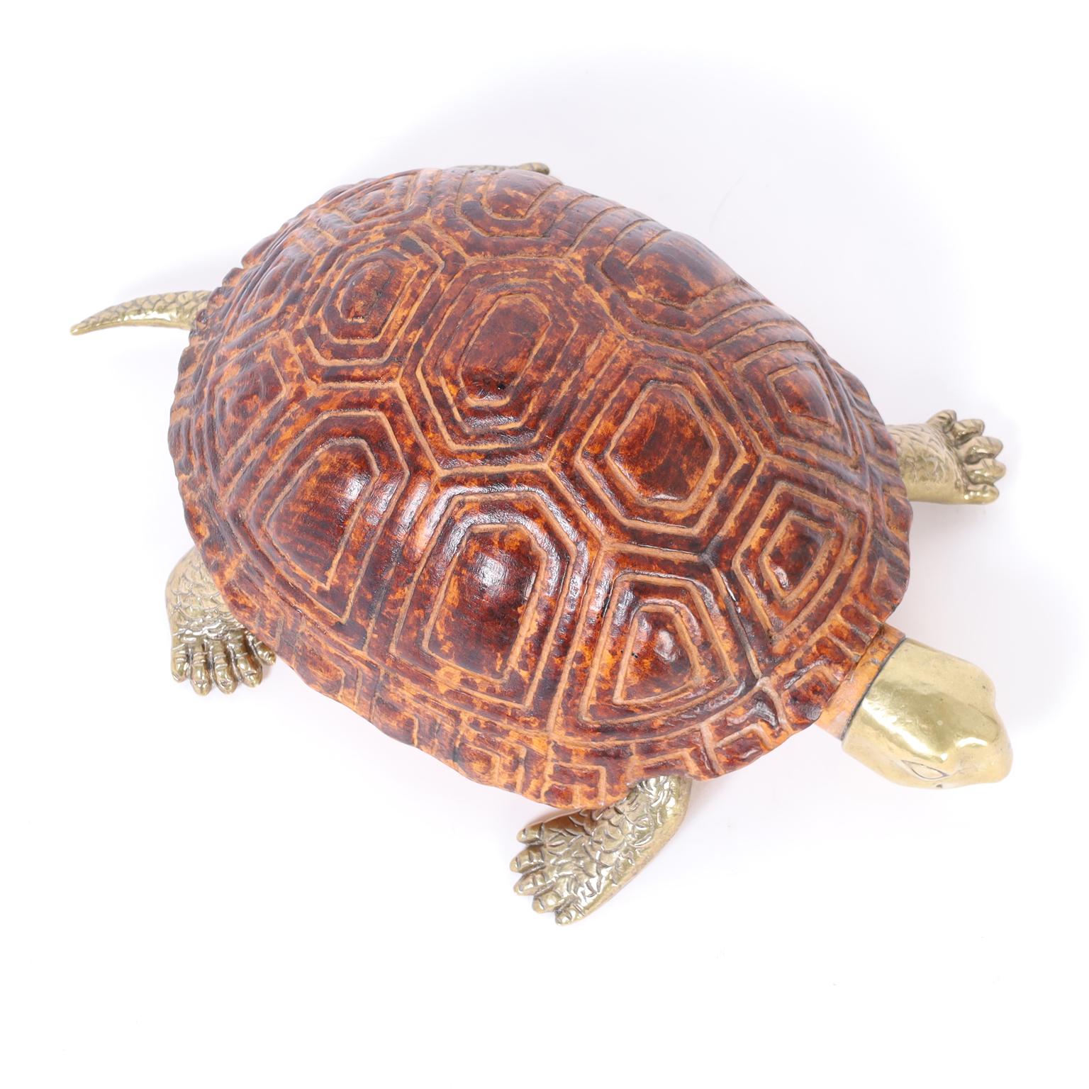 Mid-Century Italian Wood and Brass Turtle or Tortoise with a carved and stained wood shell and cast brass head, feet and tail. Signed and numbered on the bottom.
