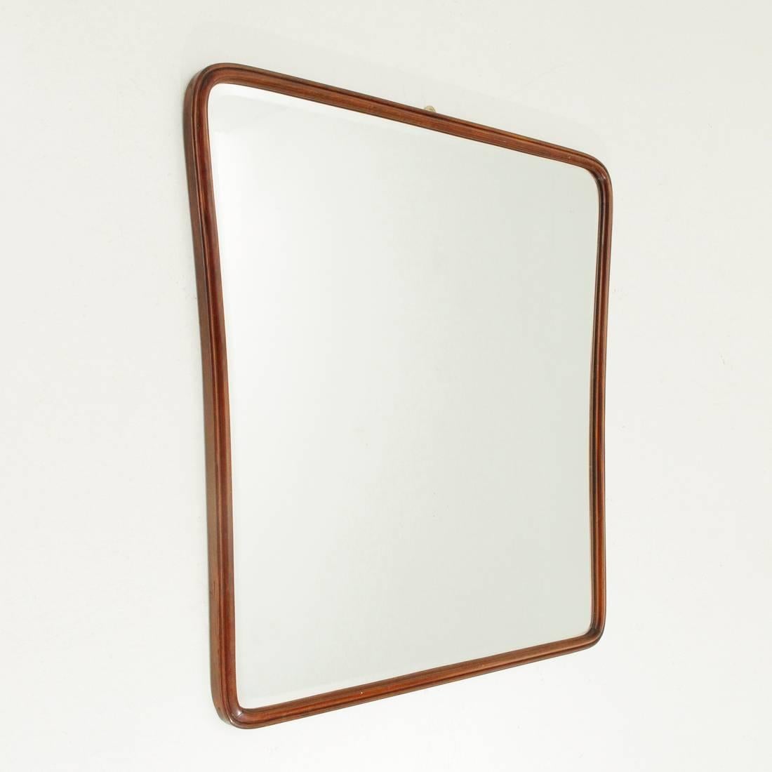 Elegant Italian mirror produced in the 1950s.
Wooden structure, surface mirrored glass, wood frame.
Good general conditions, some signs due to normal use over time.

Dimensions: Width 97 cm, depth 4 cm, height 97 cm.