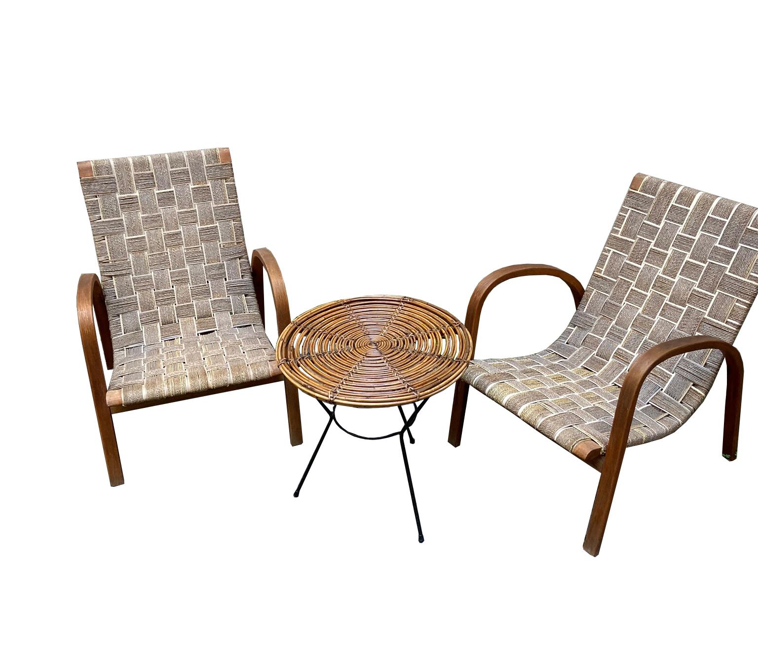 Elegant pair of terrace or garden armchairs with wooden structure and seat made of handwoven rope, 1940s.