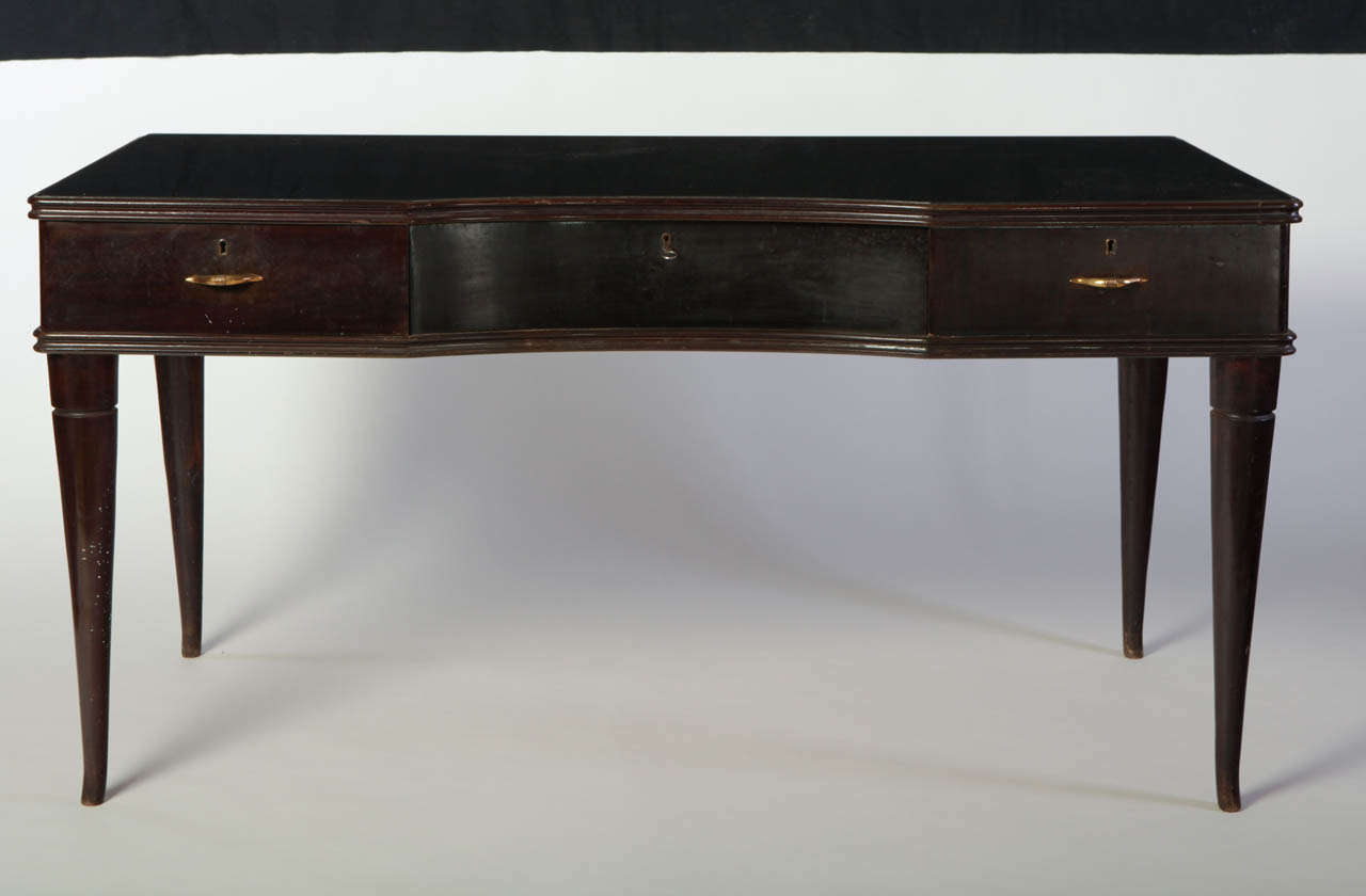 1950s Italian writing table lacquered wood with three drawers.