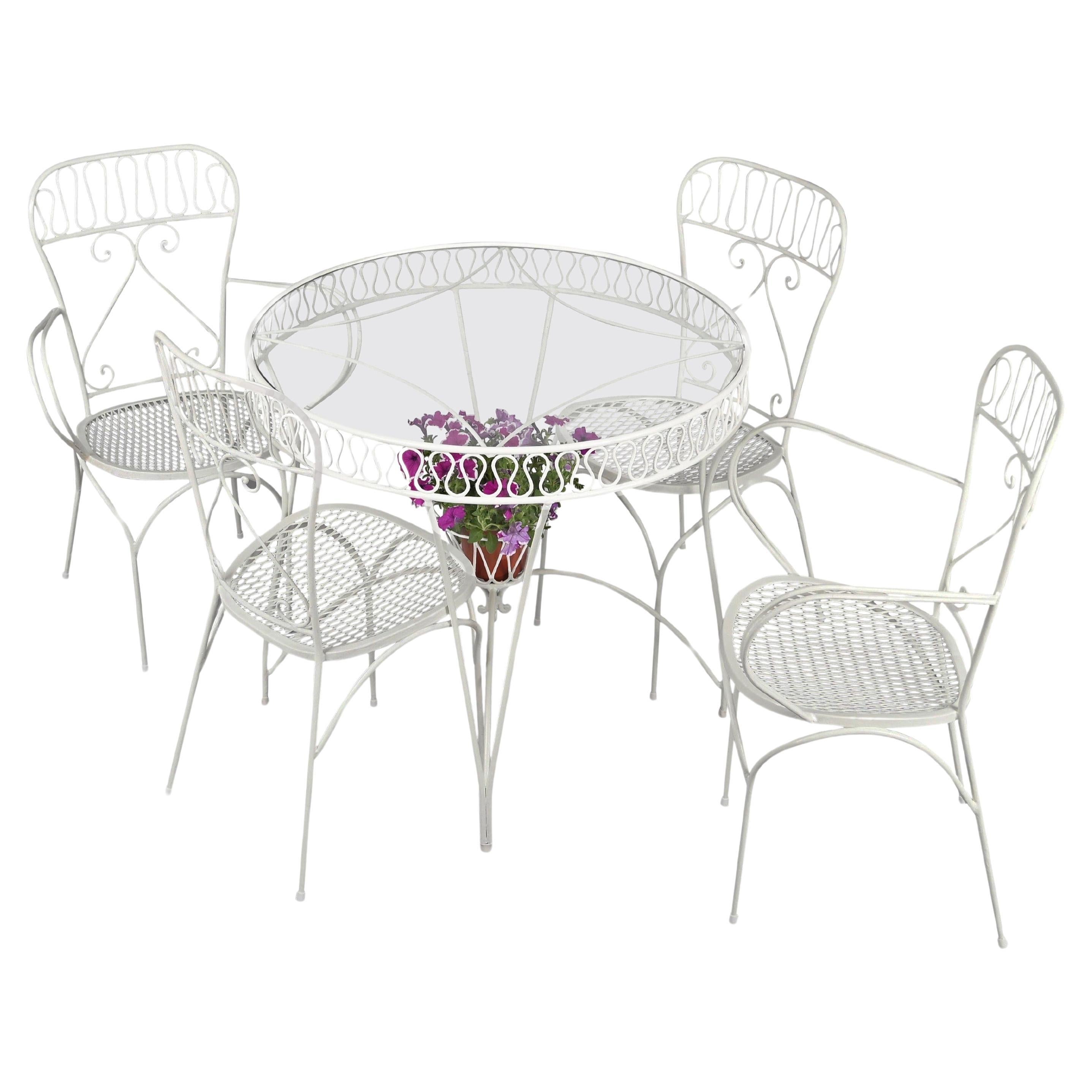 Ensemble en fer forgé italien du milieu du siècle, 4 chaises et table avec support pour plantes, années 1950 en vente