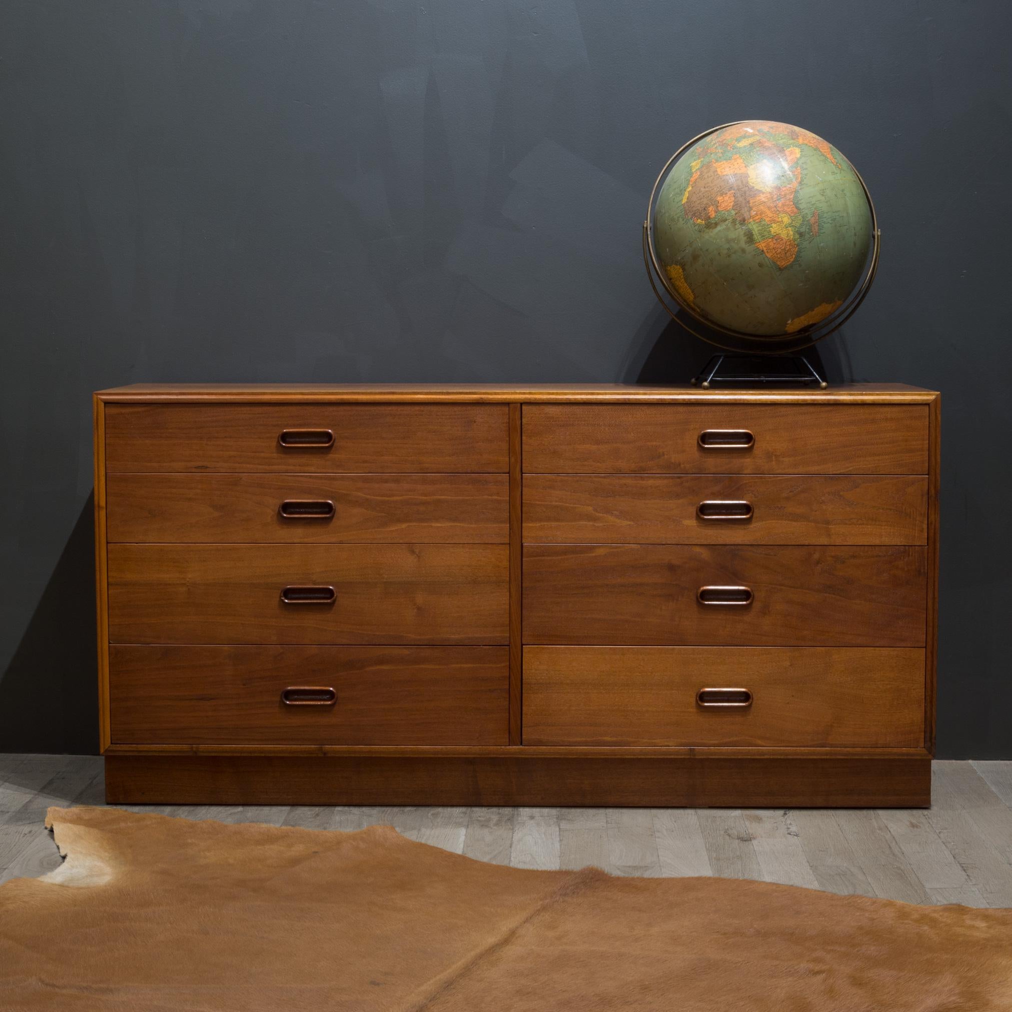 About

A Walnut credenza with elegant details and timeless simplicity. The European walnut veneer is in good original condition with two black 1