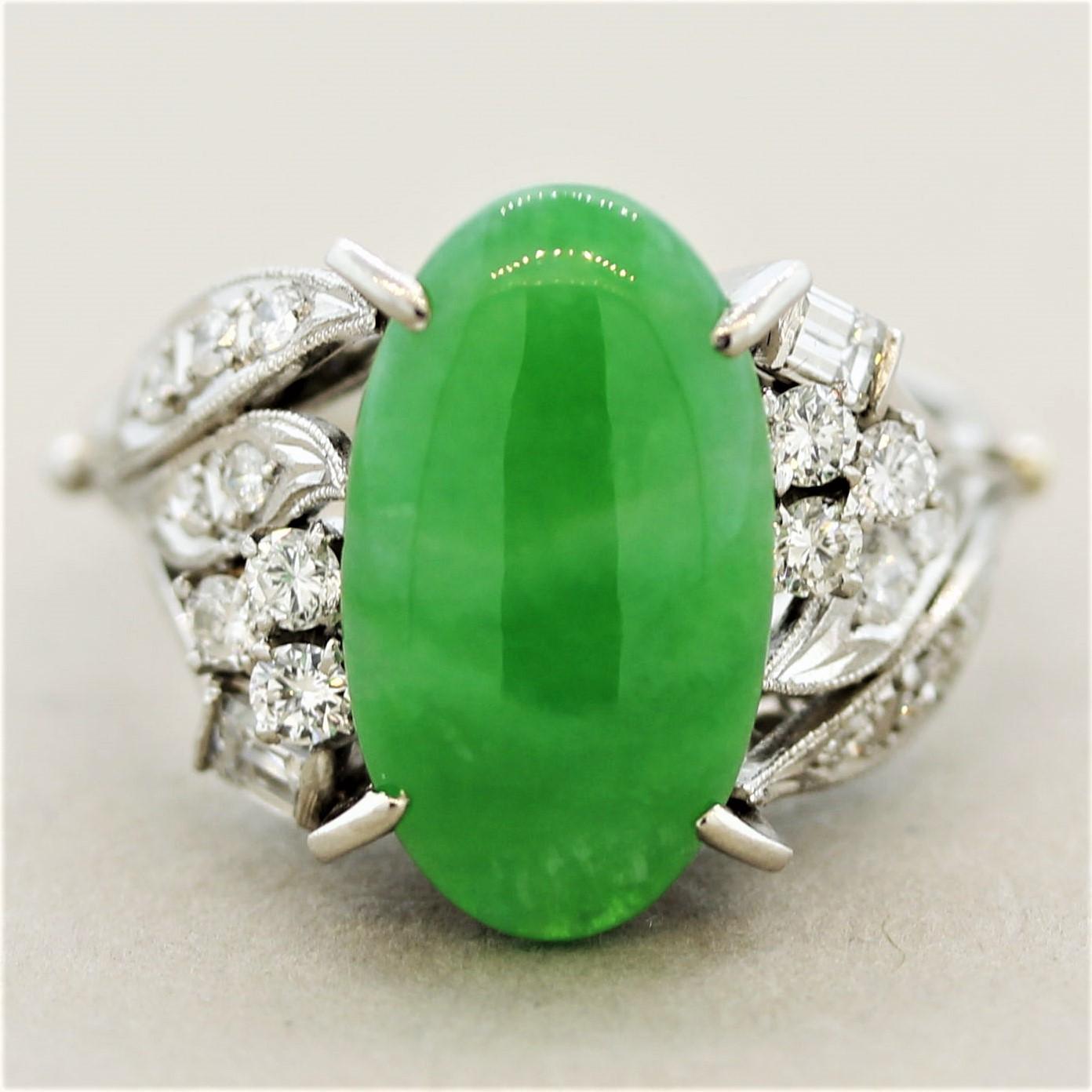A mid-century treasure from the 1950’s-1960’s! It features a beautiful bright green jade that is natural and free of any treatment, “Type A.” It is accented by 0.61 carats of round brilliant-cut and fancy shape diamonds set in a floral filigree