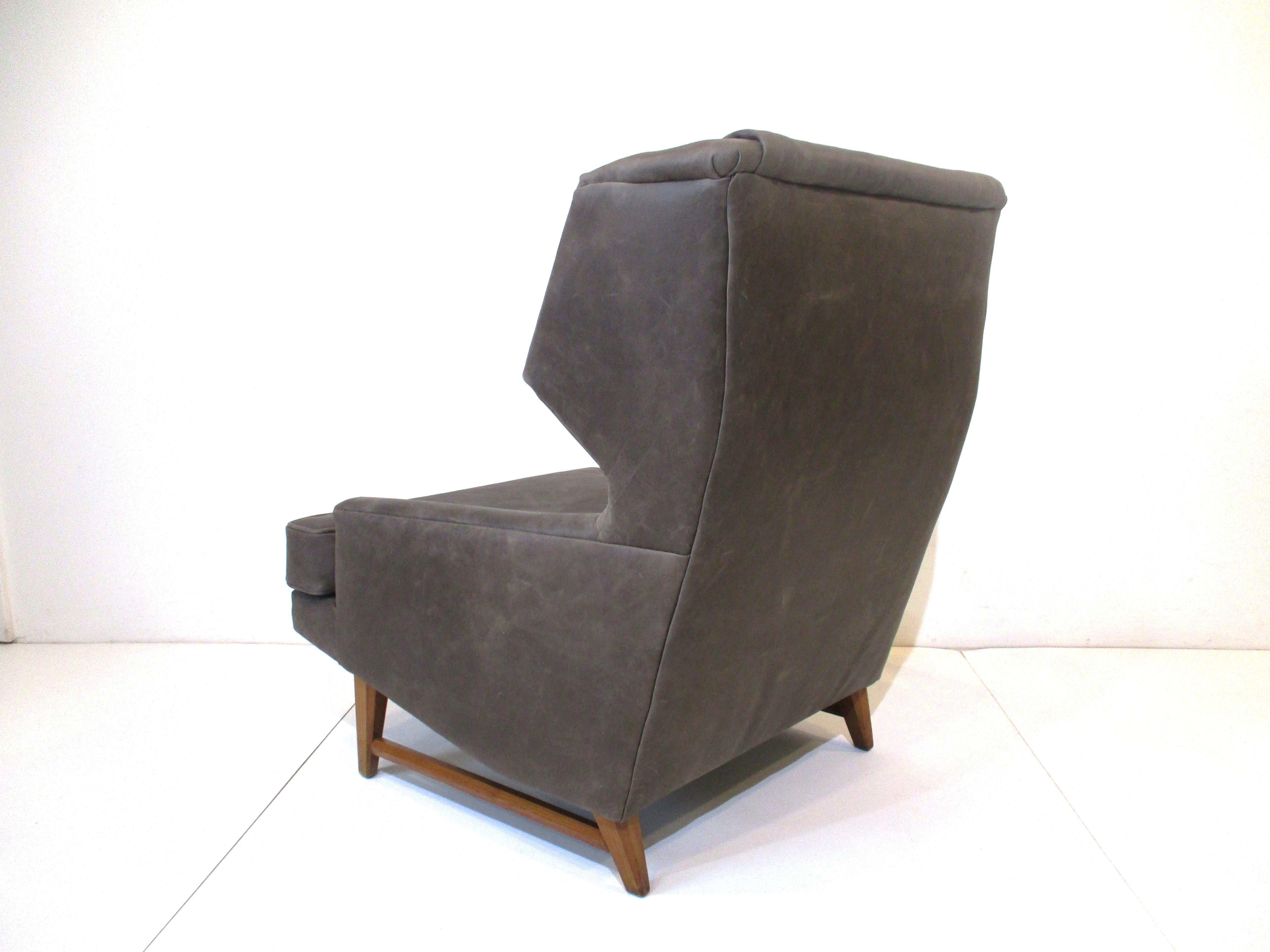 American Midcentury Janus Leather Wingback Lounge Chair in the Style of Dunbar Wormley For Sale