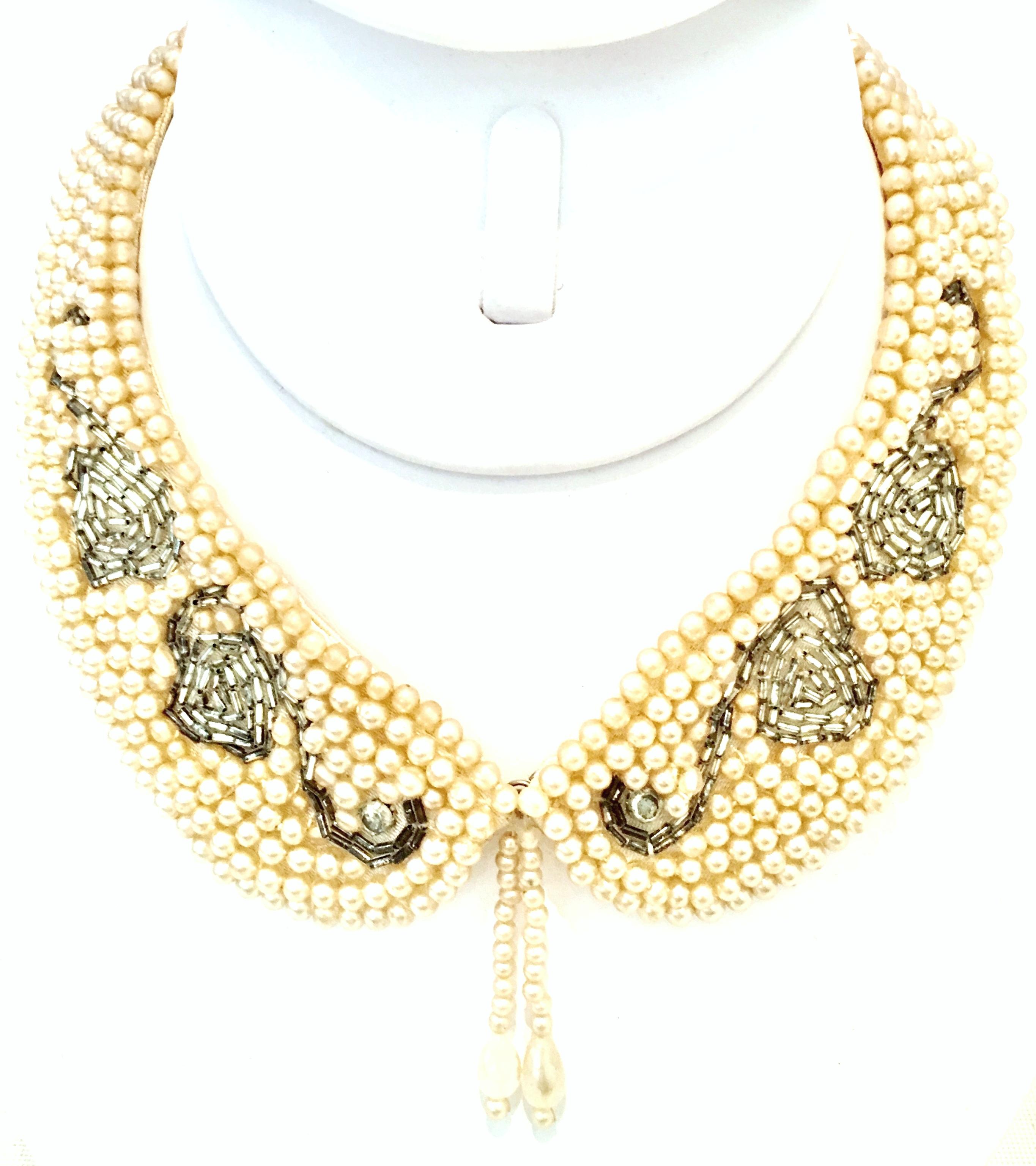 Mid- 20th Century Japanese Faux Pearl & Crystal Rhinestone choker style Peter Pan Swan collar necklace. This stylish, timeless and classic collar necklace features a gunsmoke color Austrian crystal bead abstract swan motif. with a faux pearl bead