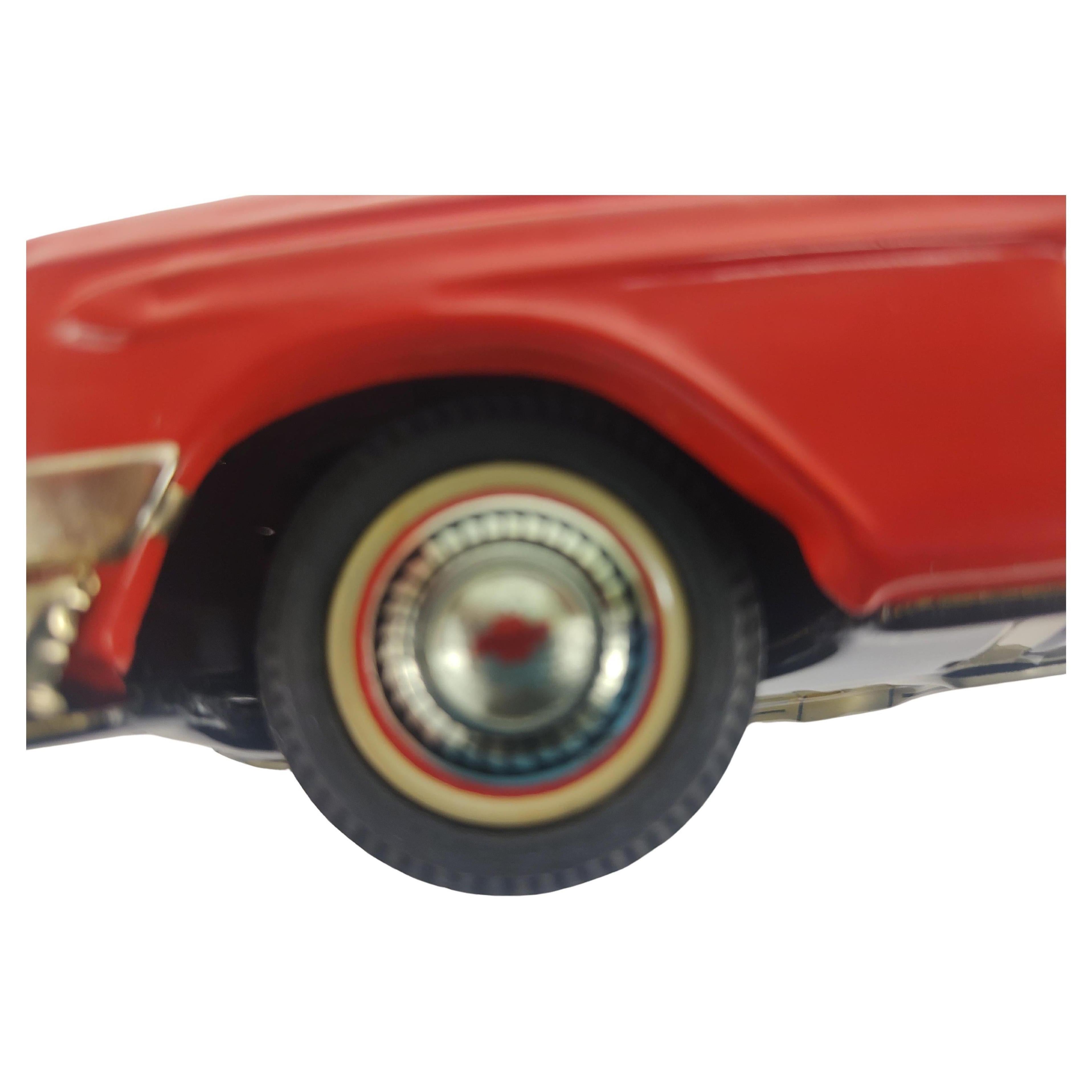 Fantastic Japanese tin litho toy car from the mid to late fifties. A Chevrolet Station Wagon in excellent vintage condition with minimal wear, practically unplayed with. Friction motor as strong as day one. Red & black with fitted interior. Came
