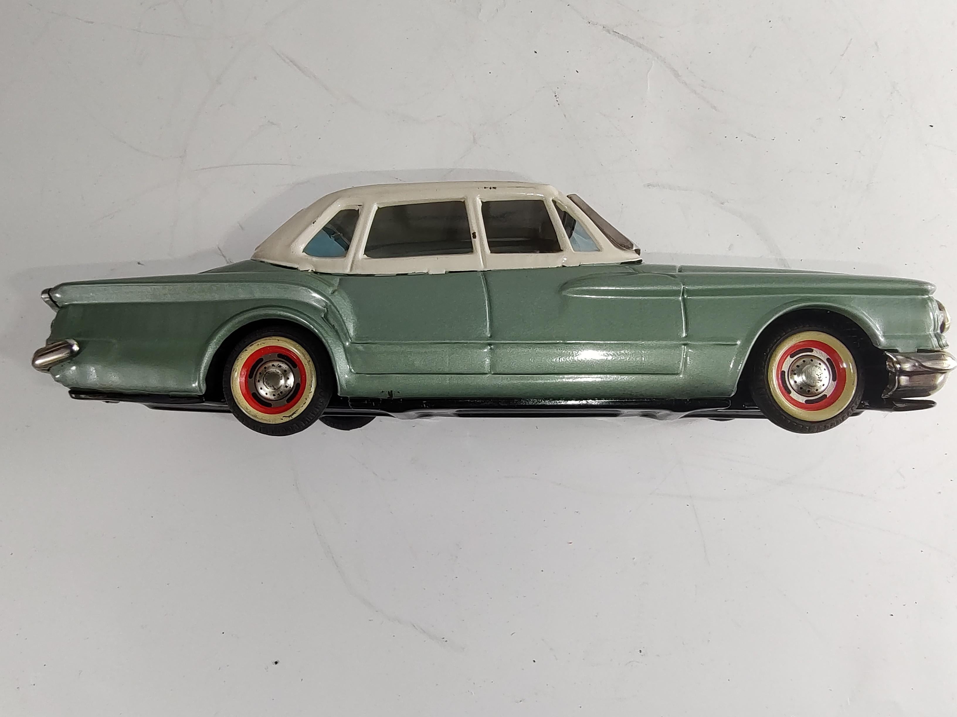 Rubber Midcentury Japanese Tin Litho Toy Plymouth Valiant, circa 1962 For Sale