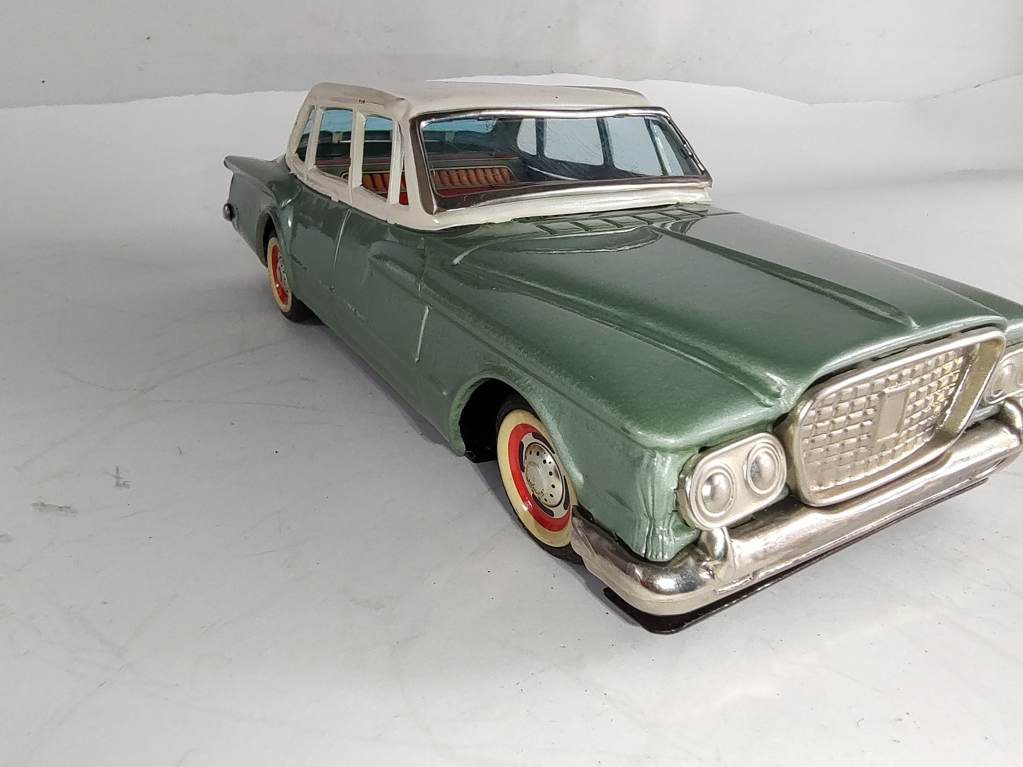 Industrial Midcentury Japanese Tin Litho Toy Plymouth Valiant, circa 1962 For Sale