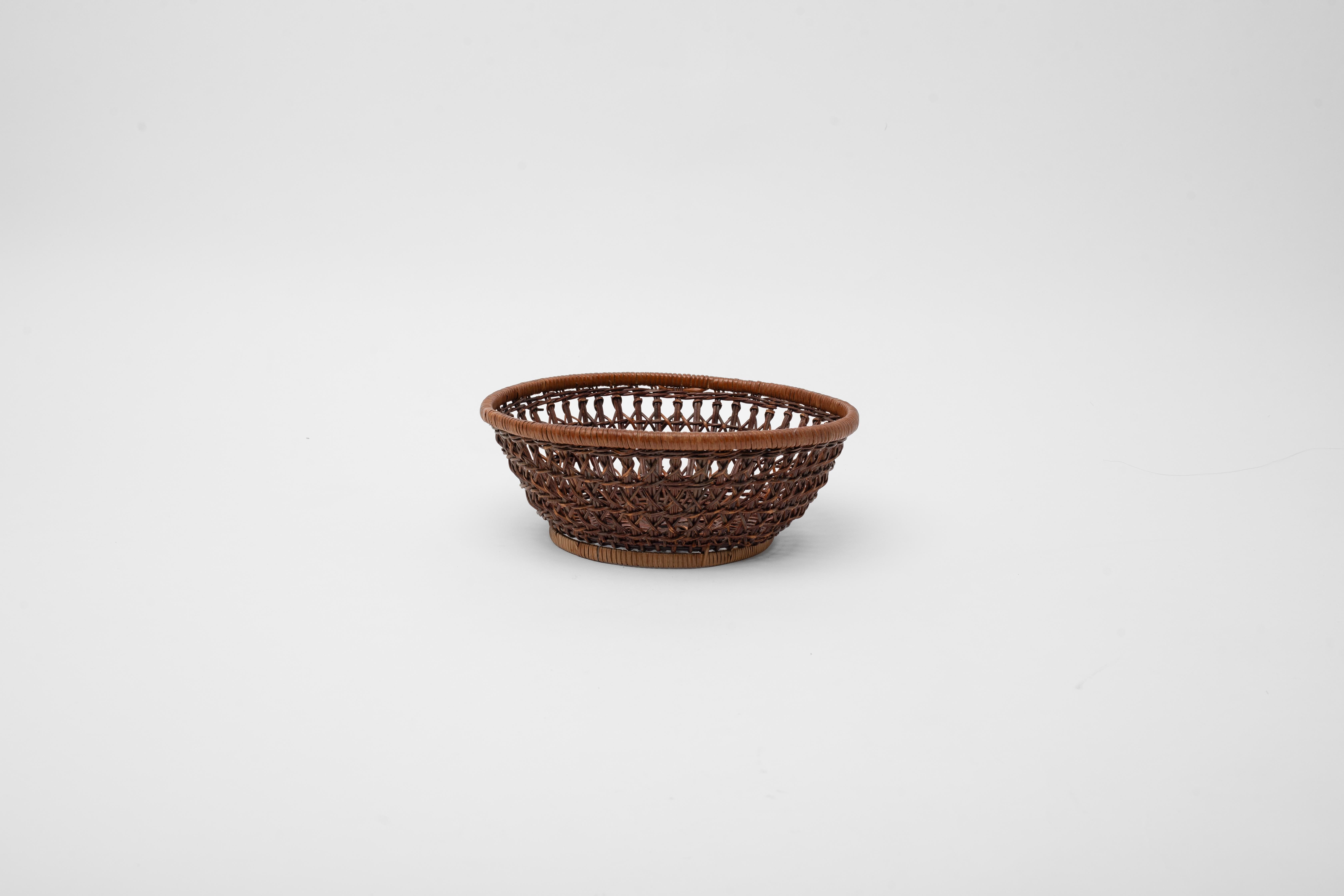 Unique piece from Japan

Beautifully handcrafted bamboo basket with intricate weaving technique and lovely shape. Simple and elegant. A handmade quality piece - built for function, designed for pleasure.

Wonderful condition - would make an