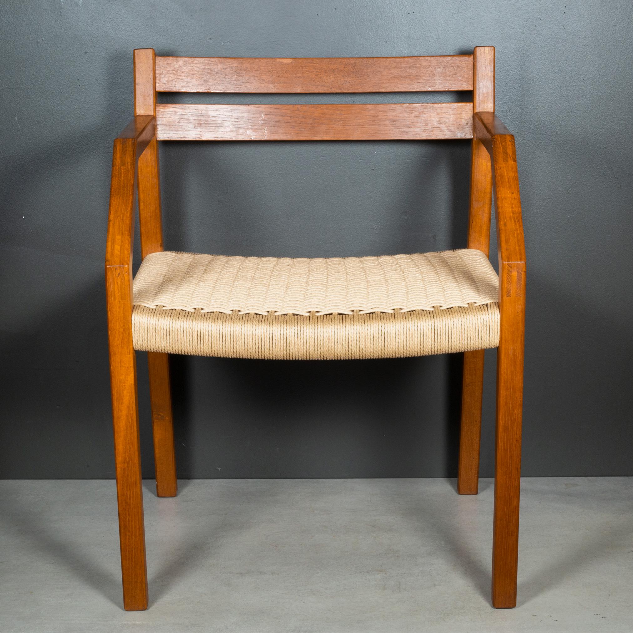 ABOUT

A set of six J.L. Moller Model #404 dining chairs, designed in 1974 by Jorgen Henrik Moller for J.L. Moller Mobelfabrik of Denmark. The chairs are crafted of solid teak and paper cord seats. Two rare armchairs which are slightly wider and