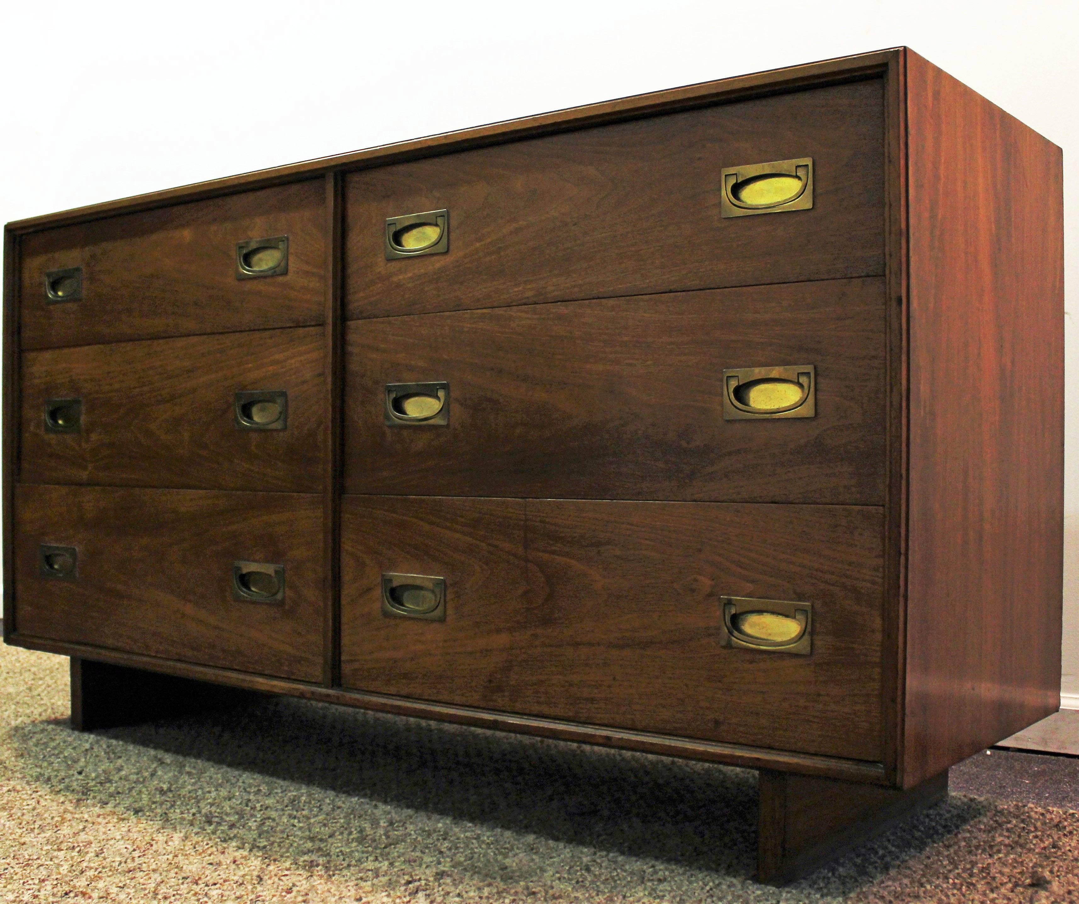Offered is a walnut 6-drawer dresser by John Widdicomb. Features brass hardware. 