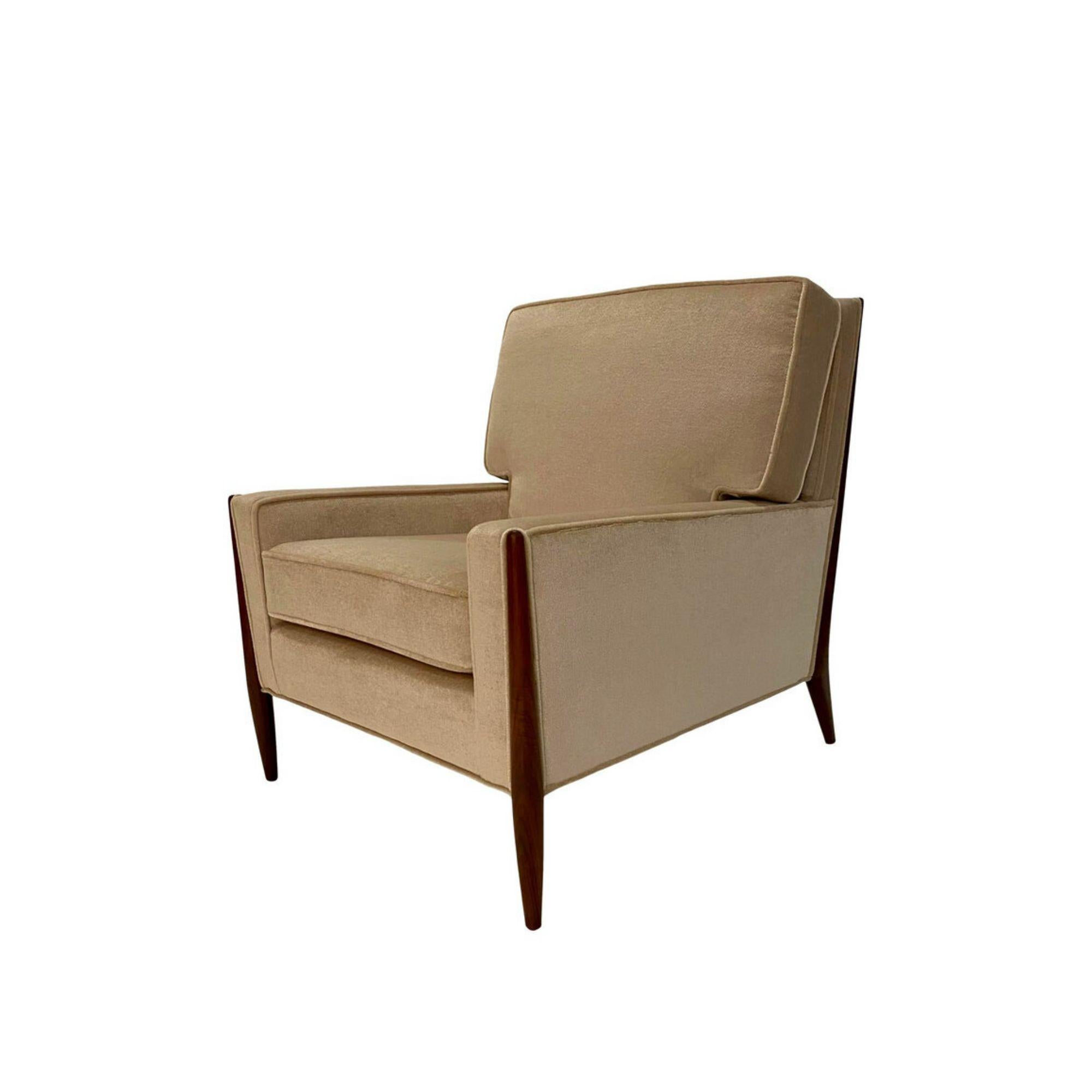 Mid-century Jules Heumann lounge chair for Metroplitan elegantly restored walnut frame and upholstered in a creamy tan mohair. This lovely chair is super comfortable and stunning from every angle.

Style: Art Deco Hollywood Regency, Mid-Century