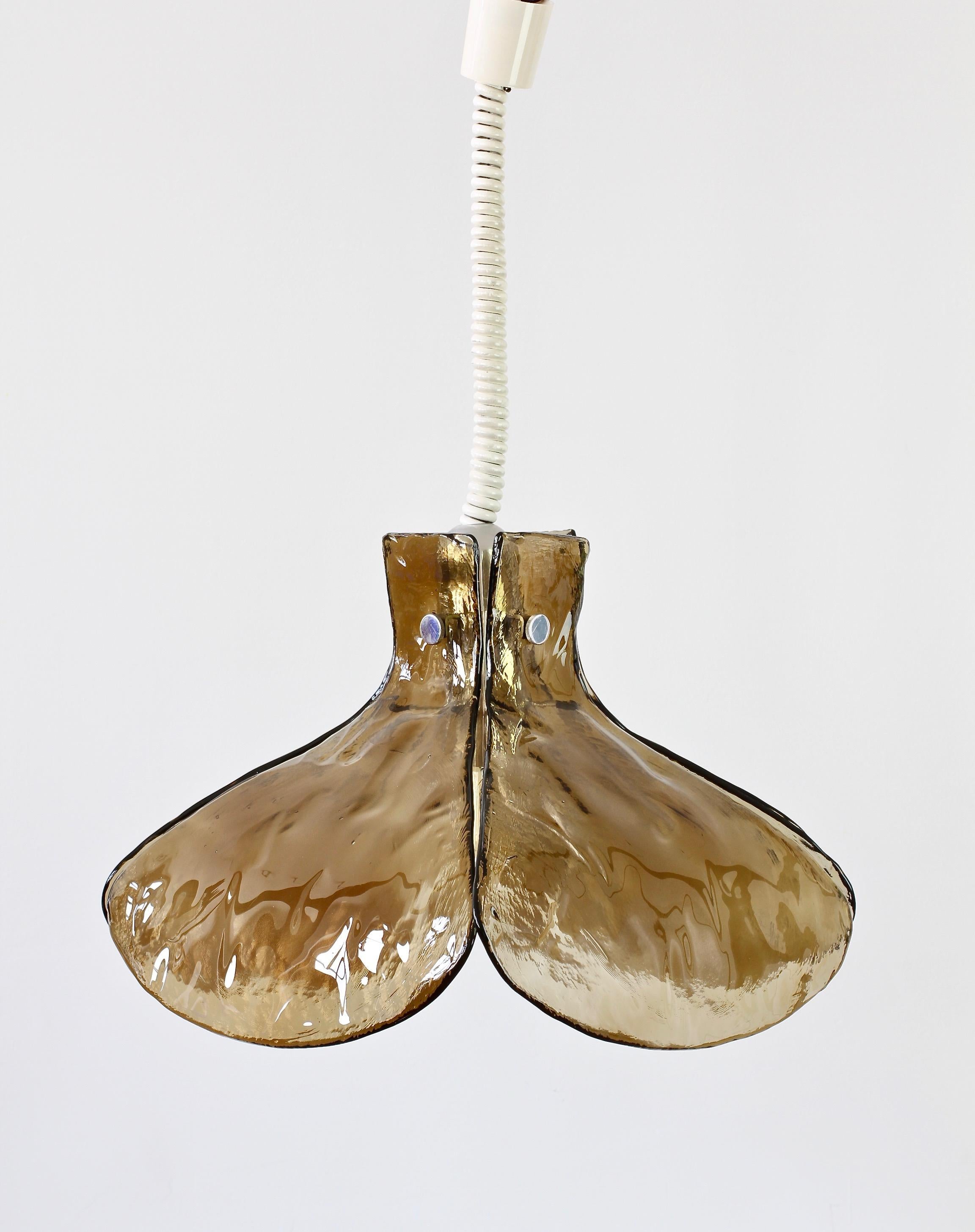 Large vintage midcentury Austrian made dark brown / topaz / smoked glass hanging pendant lamp or light fixture by Kalmar, Austria, circa late 1970s. Featuring four large flower or petal shaped glass elements, made by Italian Murano glass maker