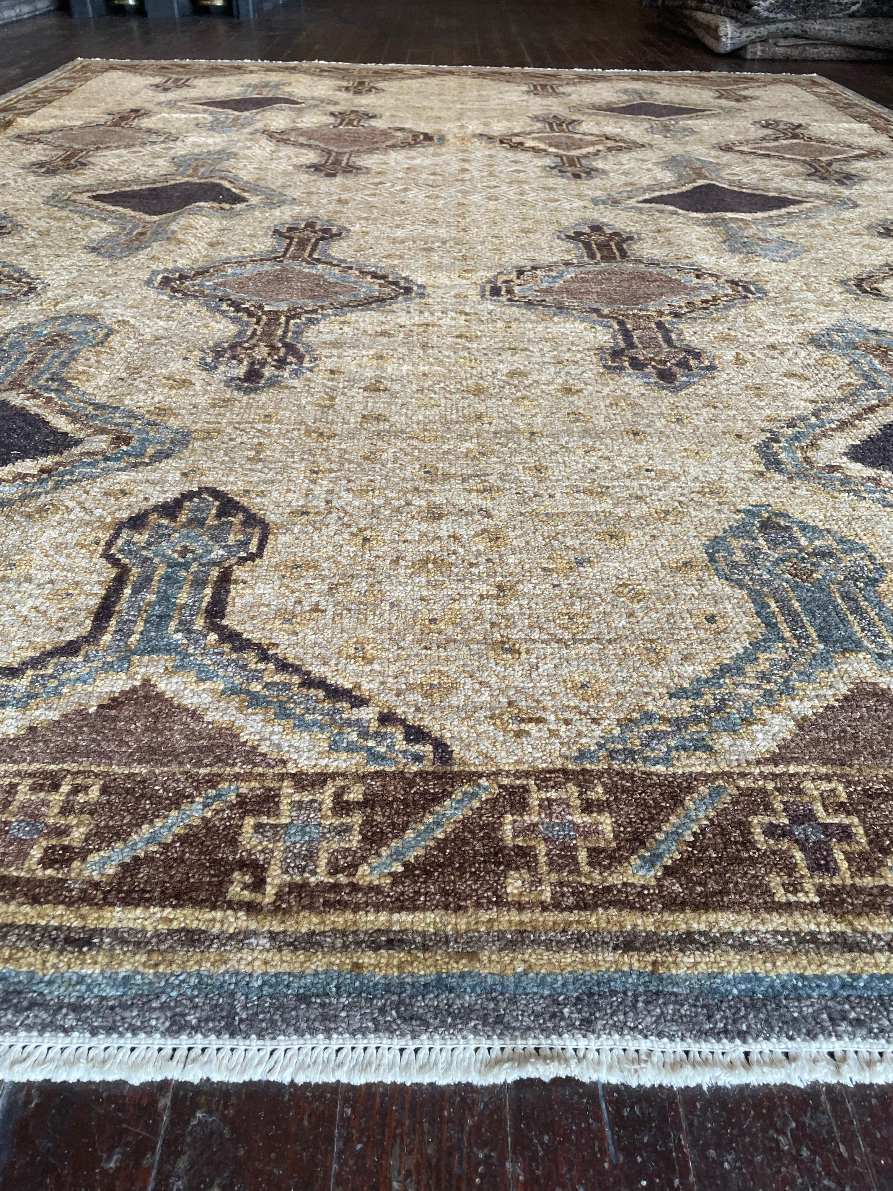 Step into a world of timeless beauty with this exquisite reproduction of a Kars rug, meticulously hand-knotted in Pakistan. Originally hailing from the Kars region in Eastern Anatolia, Turkey, Kars rugs are celebrated for their intricate geometric