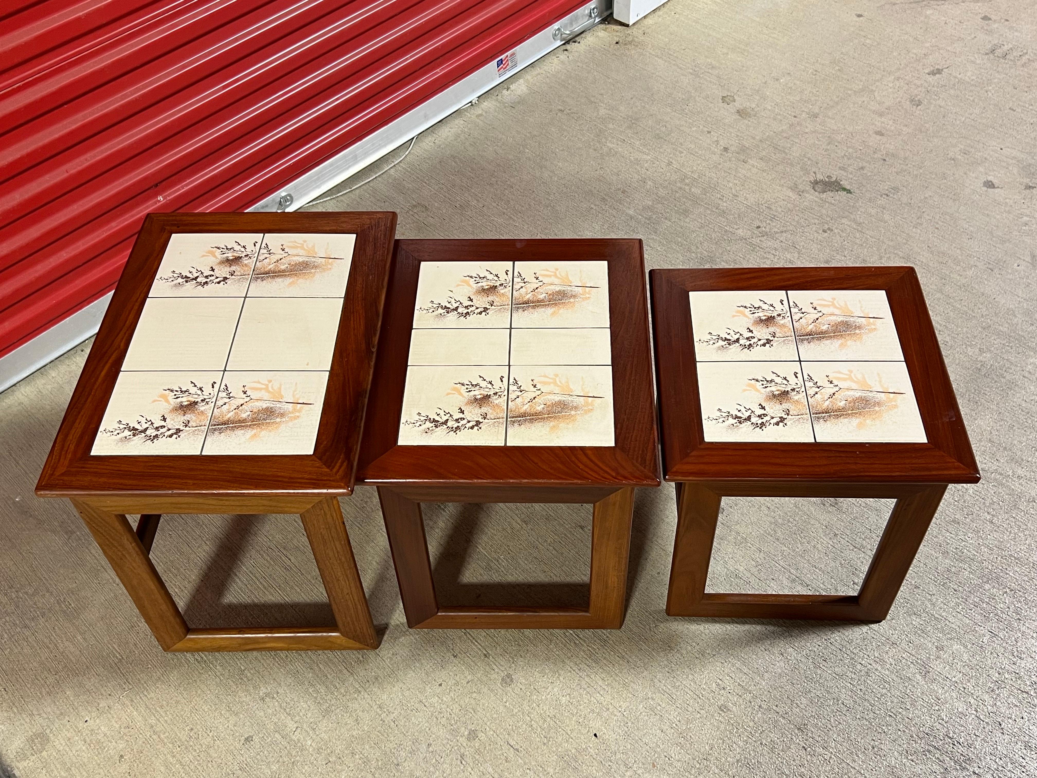 For sale is this great set of vintage nesting tables with tile tops. The tables are very well made and have a great look. The tables have the maker marks underneath