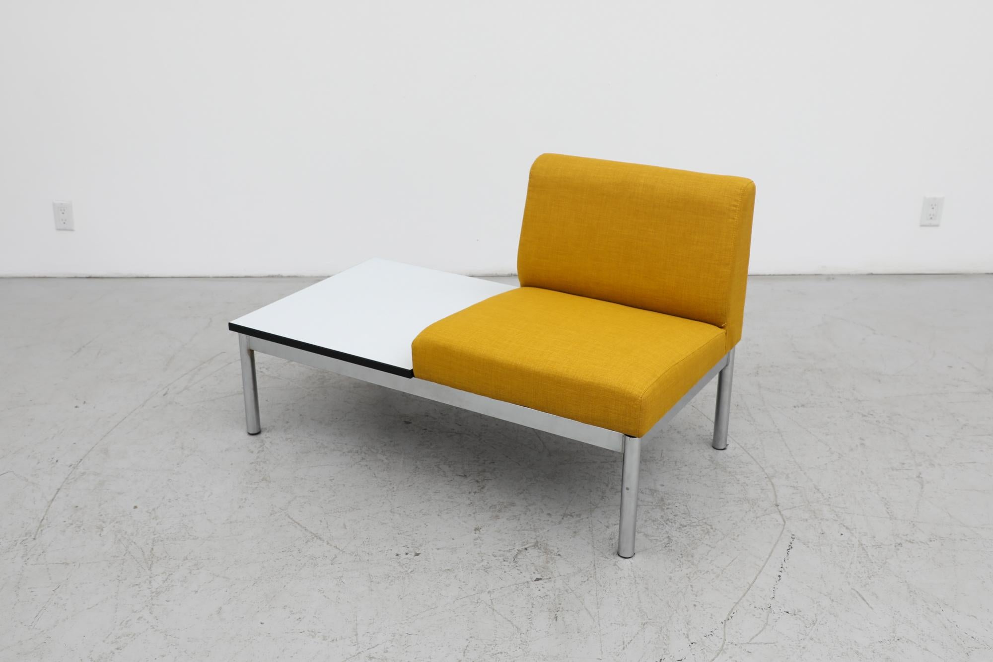 Mid-Century Kho Liang Ie Style chair with connected table, chrome frame and newly upholstered yellow seating. These are easy to swap positions by simply unscrewing from the base and flipping the seat direction, or swapping with a different unit, see