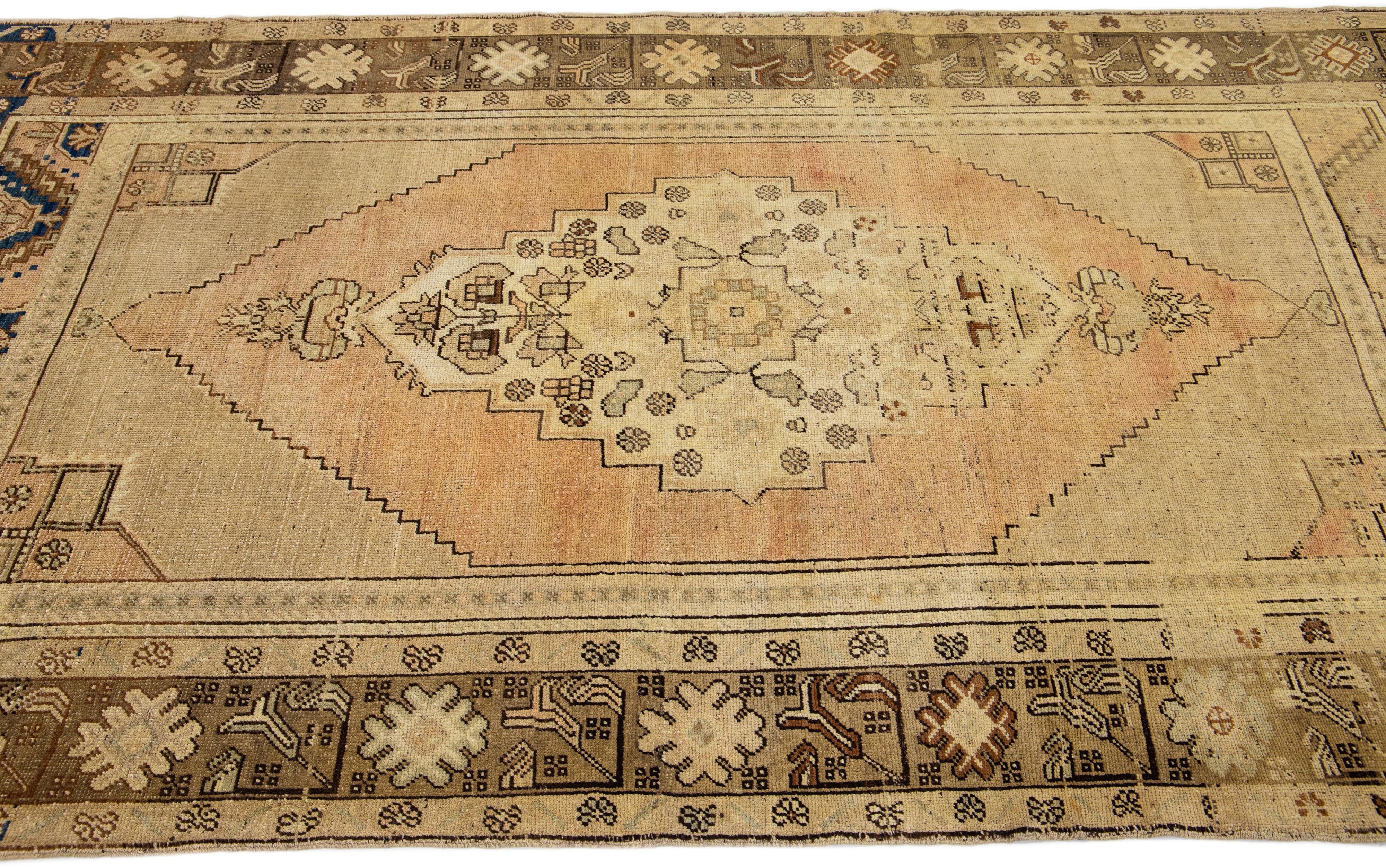 Hand-Knotted Midcentury Khotan Wool Rug with Medallion Motif in Beige For Sale