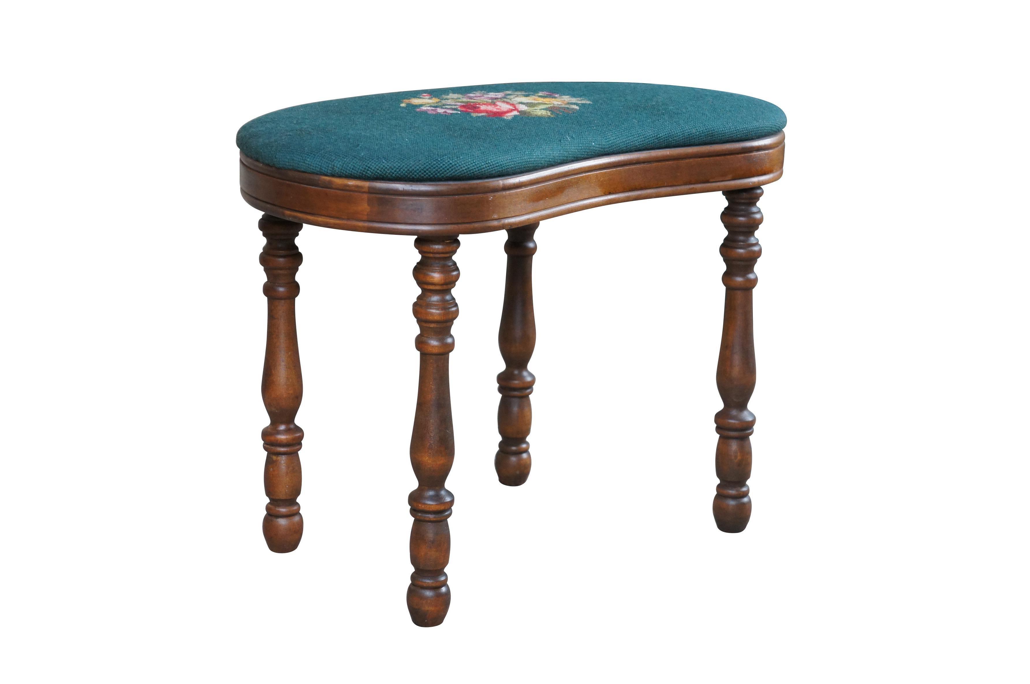 Mid 20th Century Kidney Bean Stool.  Made from walnut with needlepoint embroidered seat.  


Dimensions:
22.5