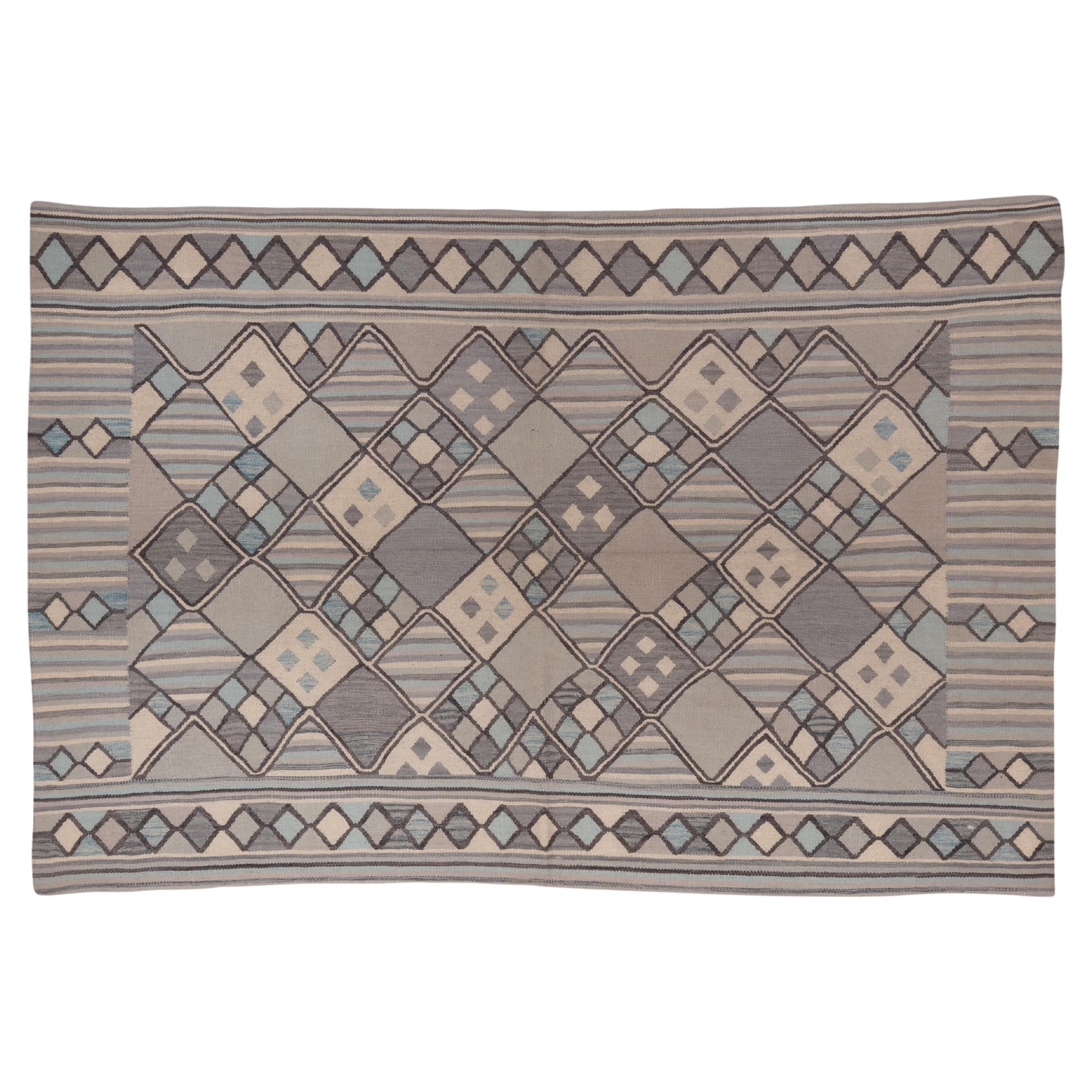 Mid Century Kilim in Muted Pastels and Oat Colors