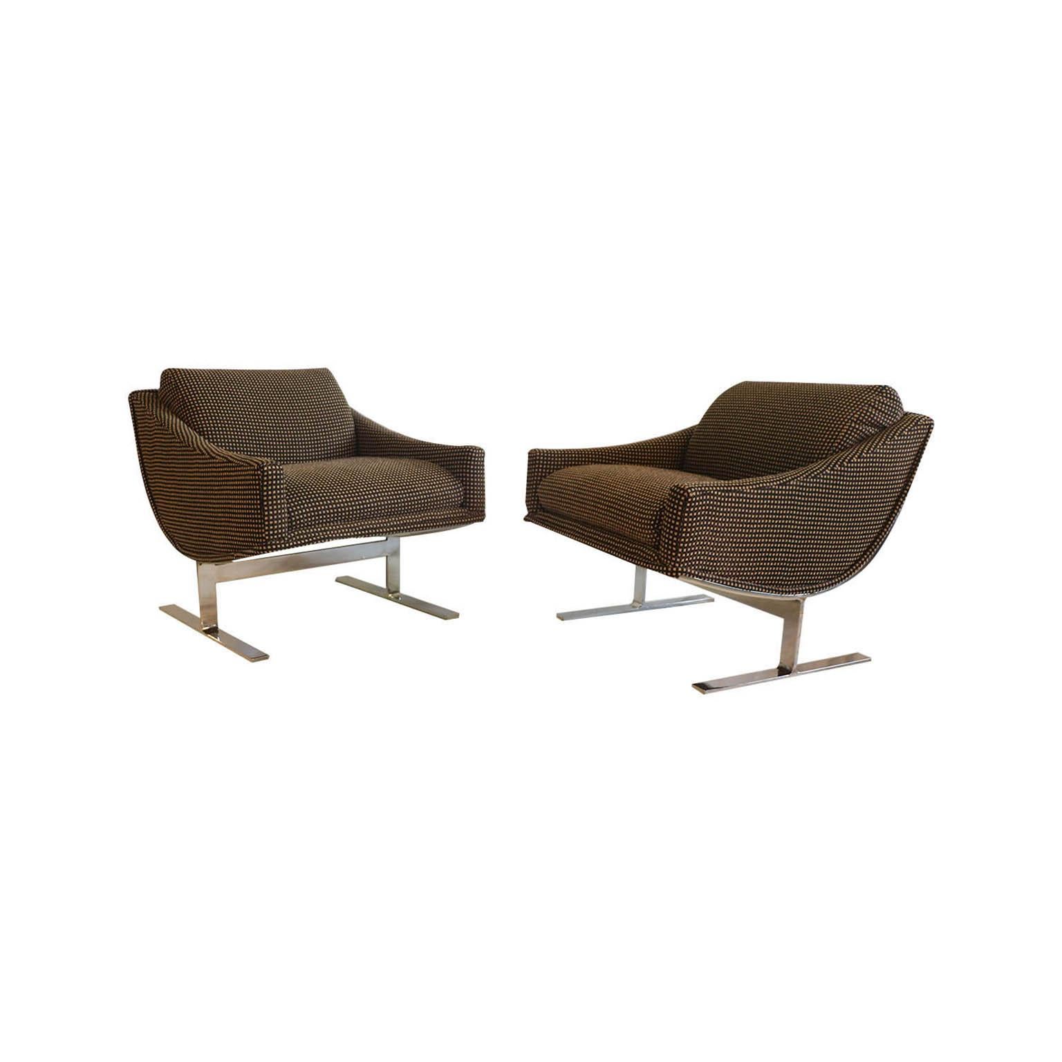 A stunning pair of Mid-Century Modern 1960s “Arc” lounge chairs designed by Kipp Stewart for Directional furniture. An exceptional pair, both for their form and quality. The pair embodies the whimsical fervor of the period, from 1960s. Featuring a