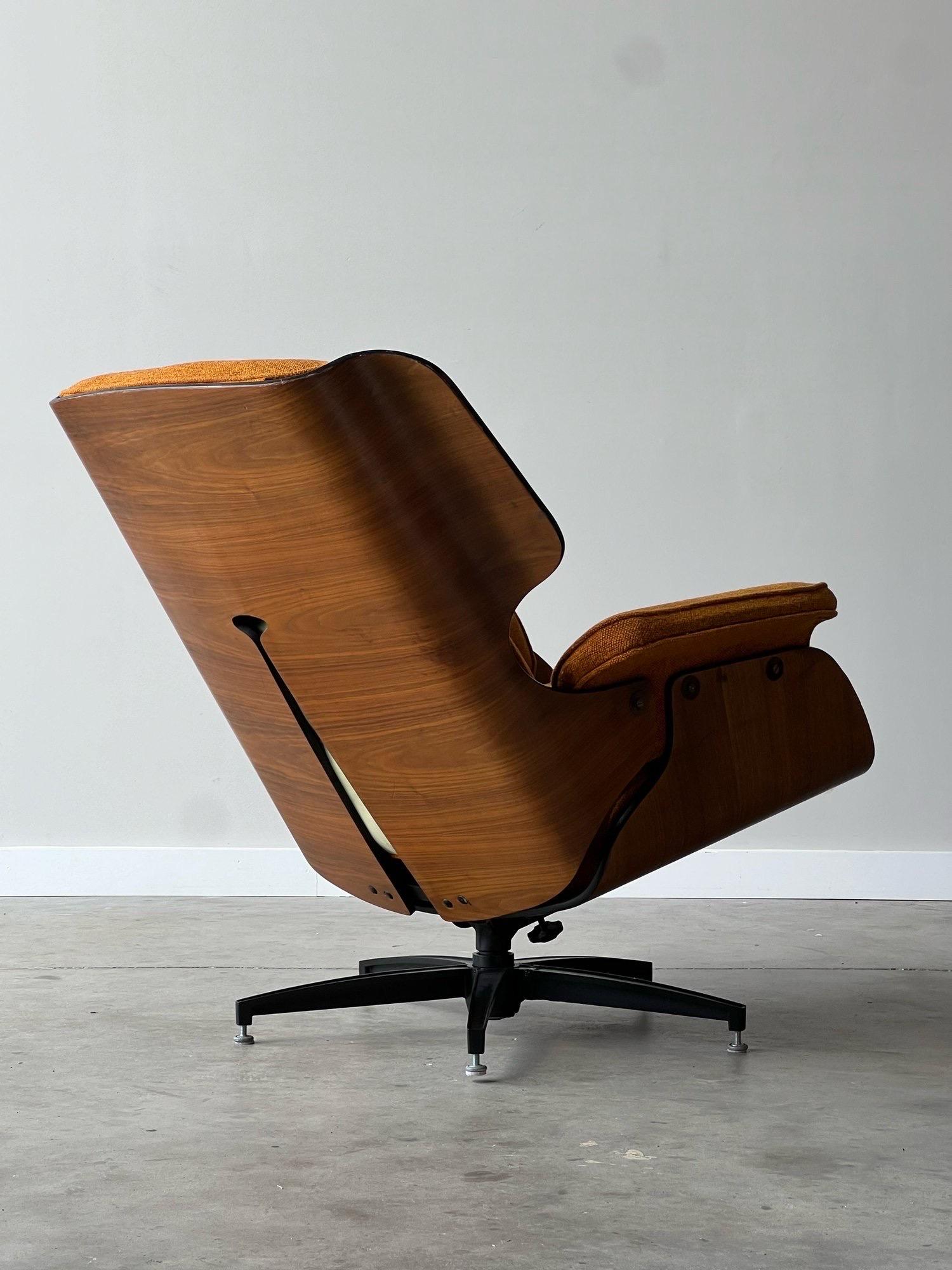 Beautiful and seldomly seen Drexel Declaration Eames style lounge chair designed by Kipp Stewart. Beautiful molded walnut ply shell with tilt and swivel 5 star base. Amazing details throughout from the top horn detail to the back. Features what