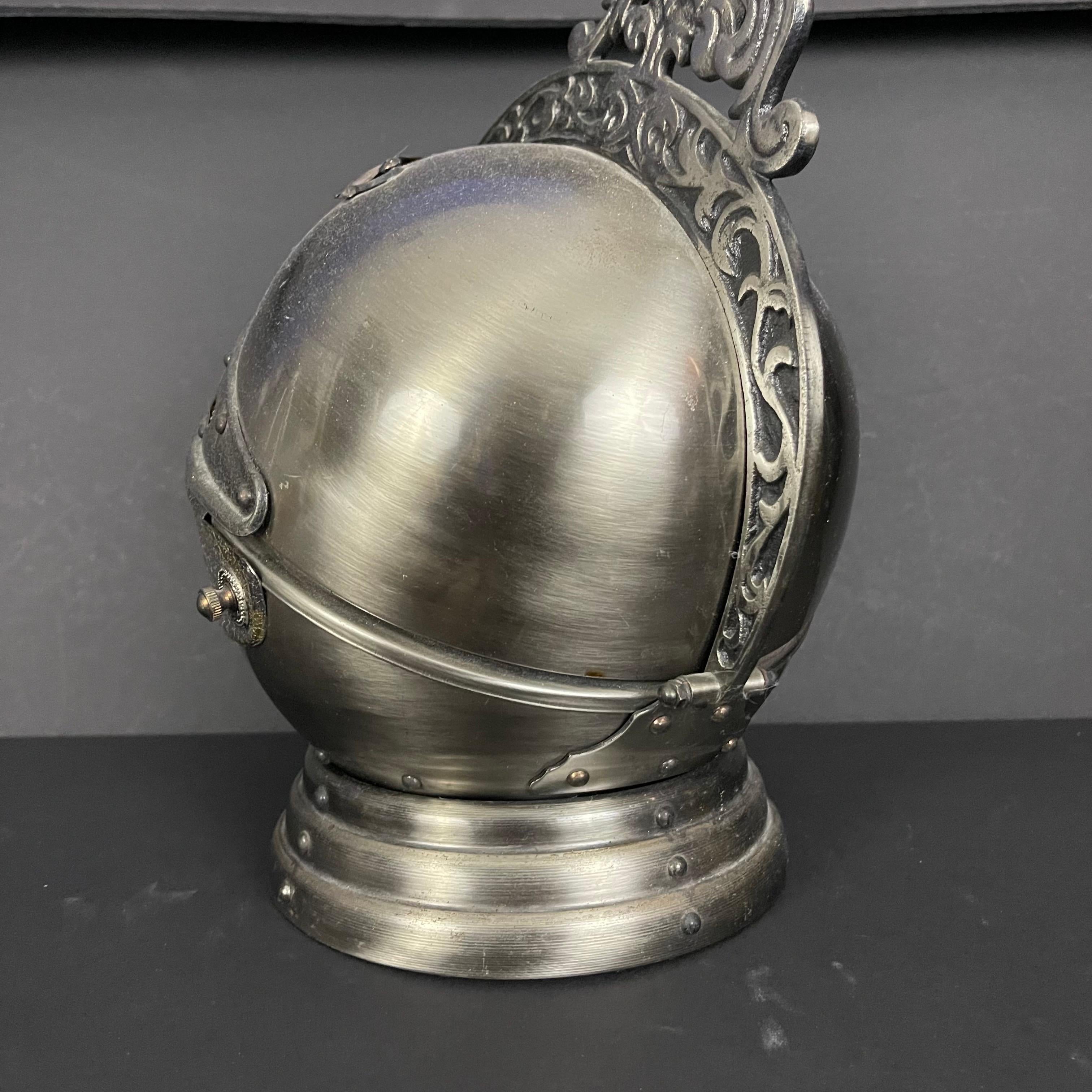 Metal Mid-Century Knight Helmet Form Musical Box Hidden Bar Serving Decanter Set For Sale