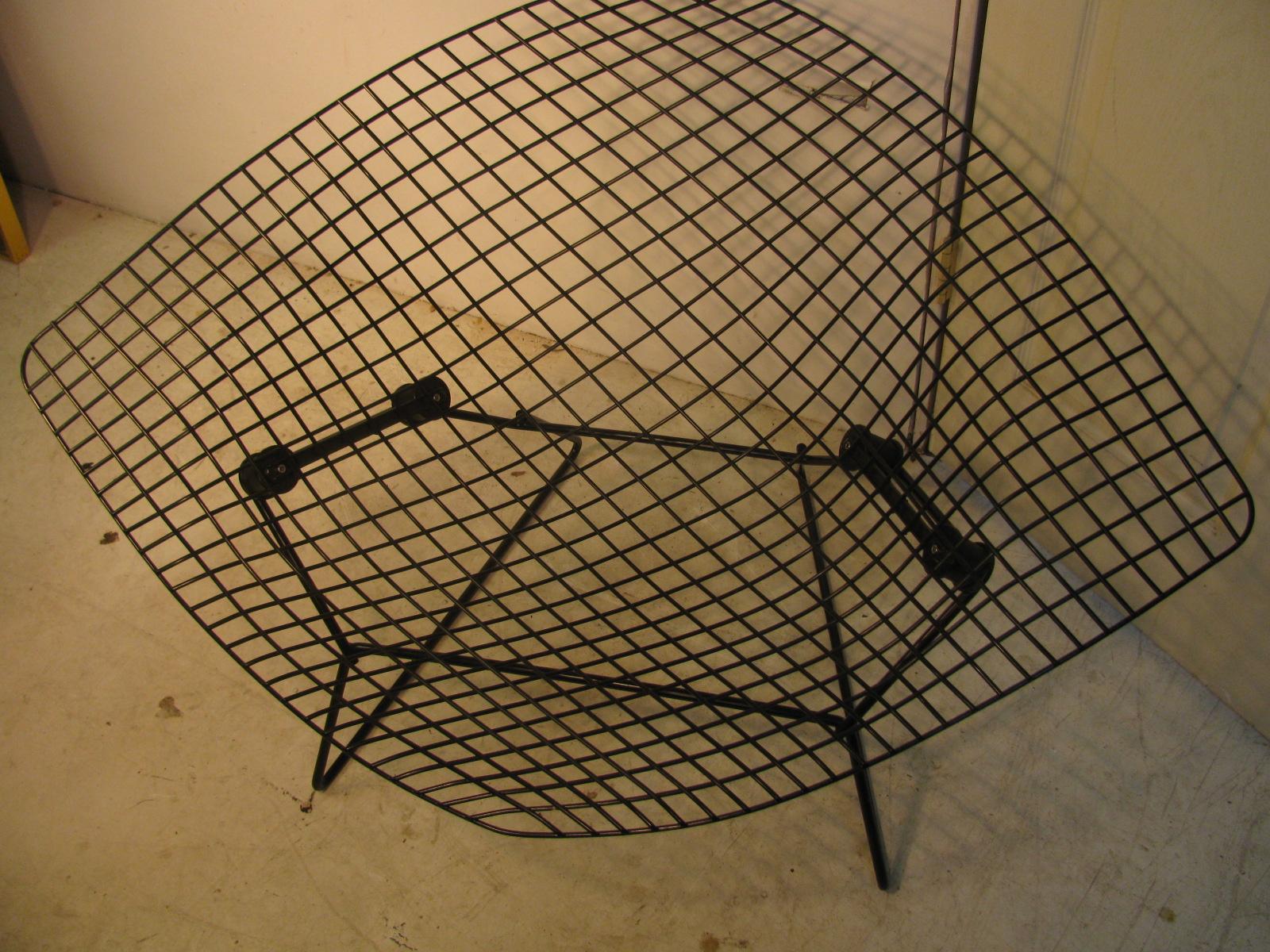 Large diamond chair by Harry Bertoia for Knoll in black with shock mounts, circa 1970 chair is in very good to excellent condition with a minor flea bite to the finish. Iconic design by Bertoia and is so comfortable. Chair was designed in 1952.1195.
