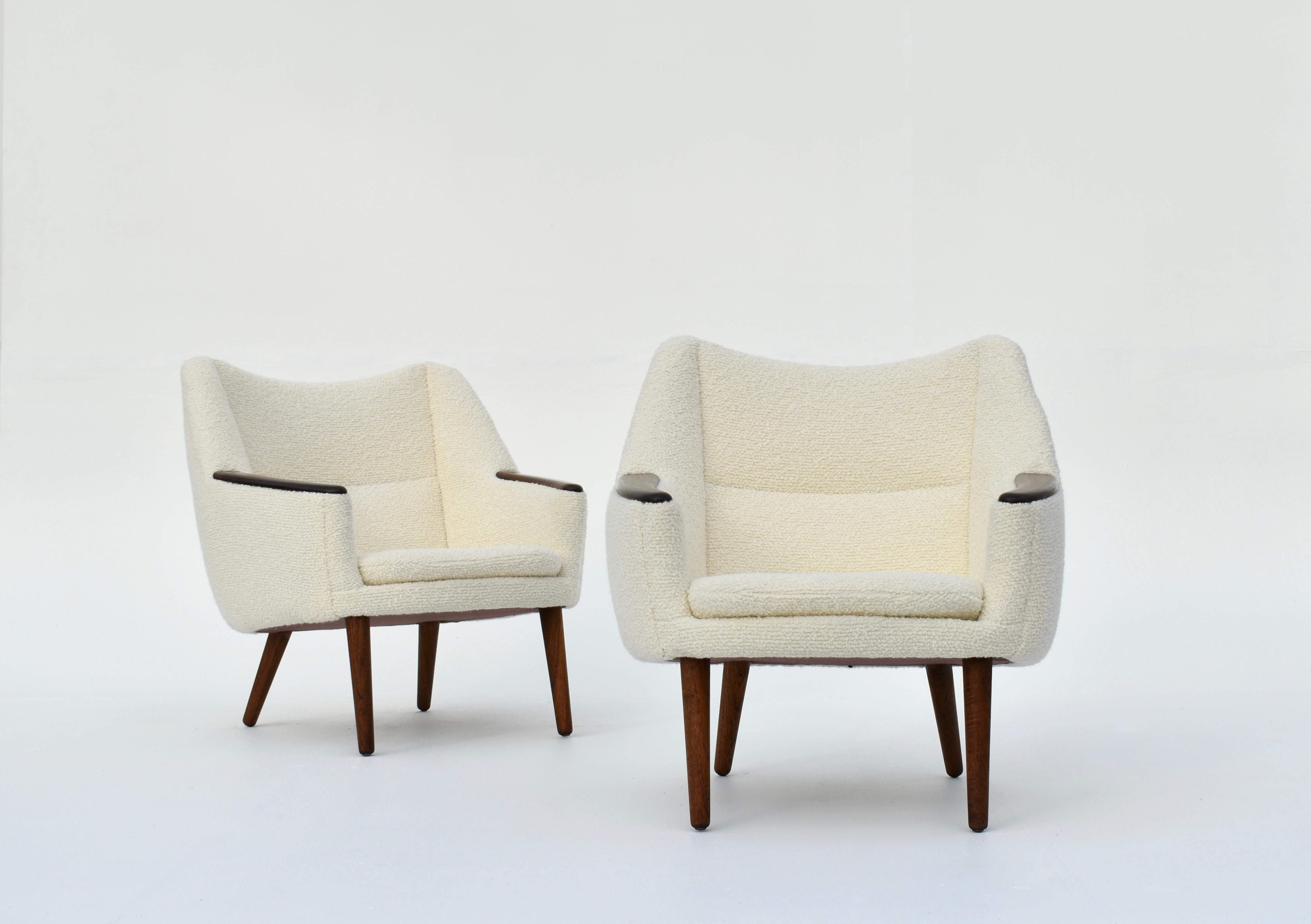 A very hard to find pair of Model 58 lounge chairs designed in the late 50s by Kurt Østervig for Rolschau Mobler, Denmark.

An incredibly handsome design with wonderful proportions.

These chairs feature Solid Brazilian rosewood armrests and