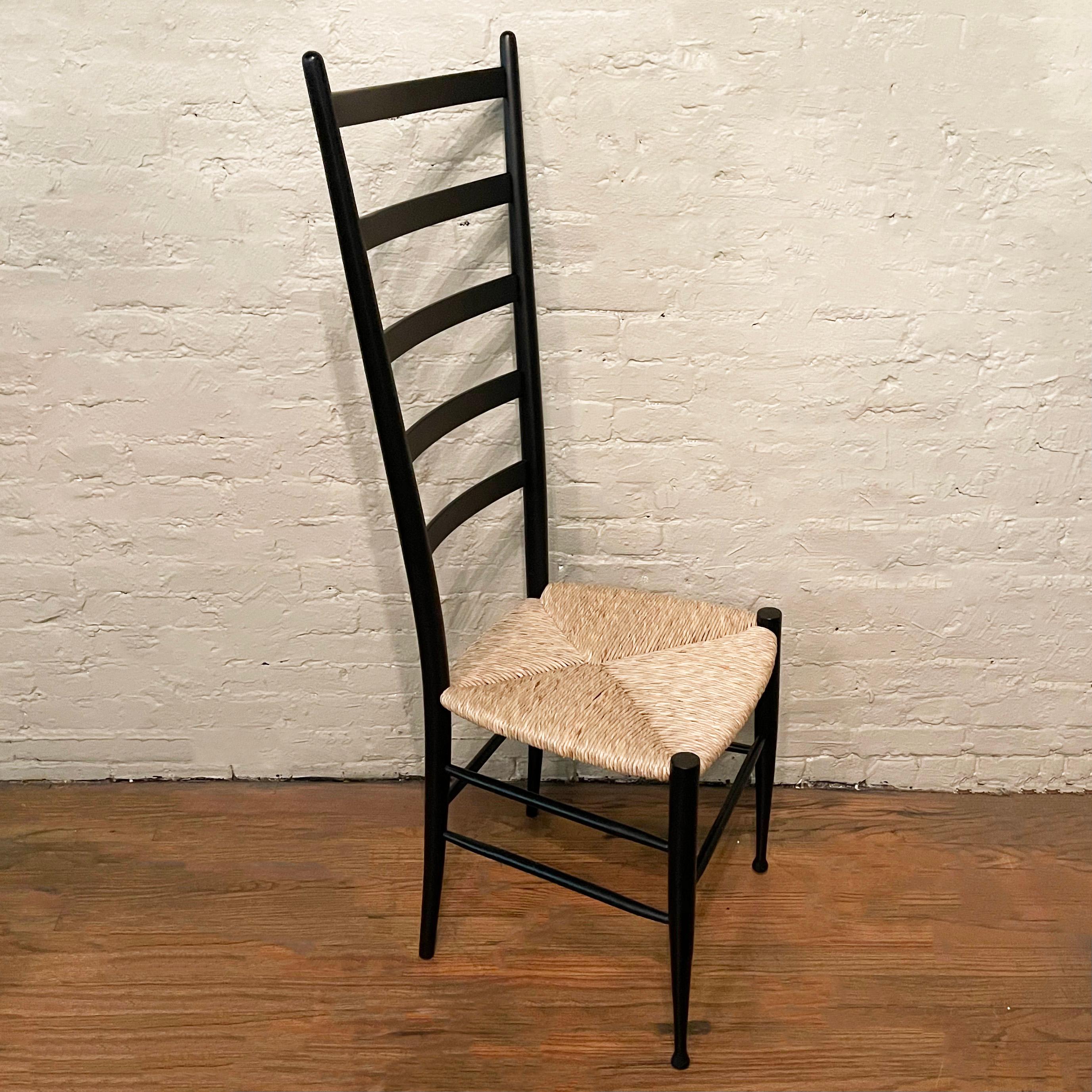 Italian, mid-century modern, tall ladder back, accent, side chair in the style of Gio Ponti features a black lacquered wood frame with woven, natural rush seat.