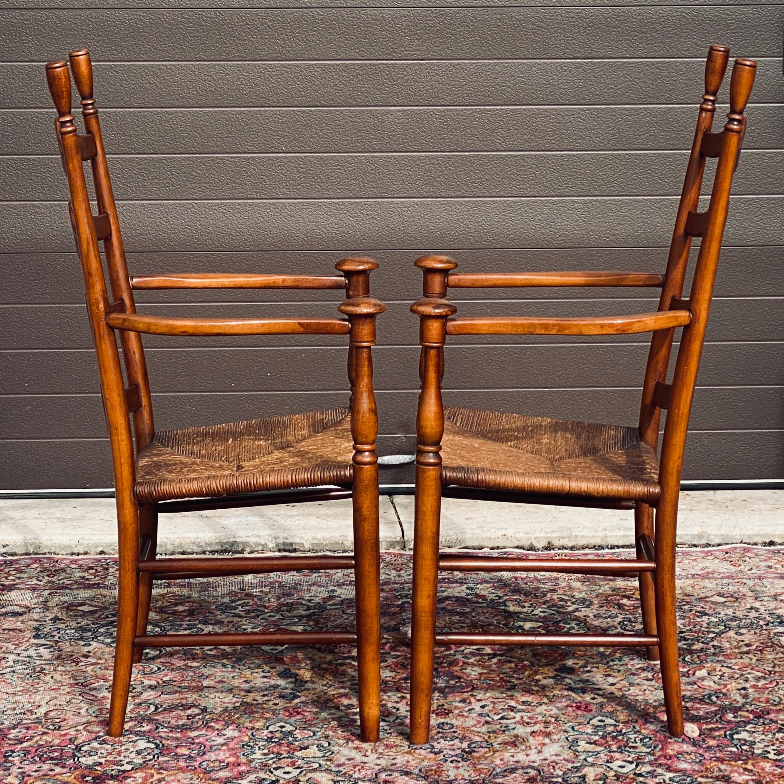 American Mid-Century Ladder Back Rush Seat Mushroom Cap Farmhouse Arm Chairs - a Pair