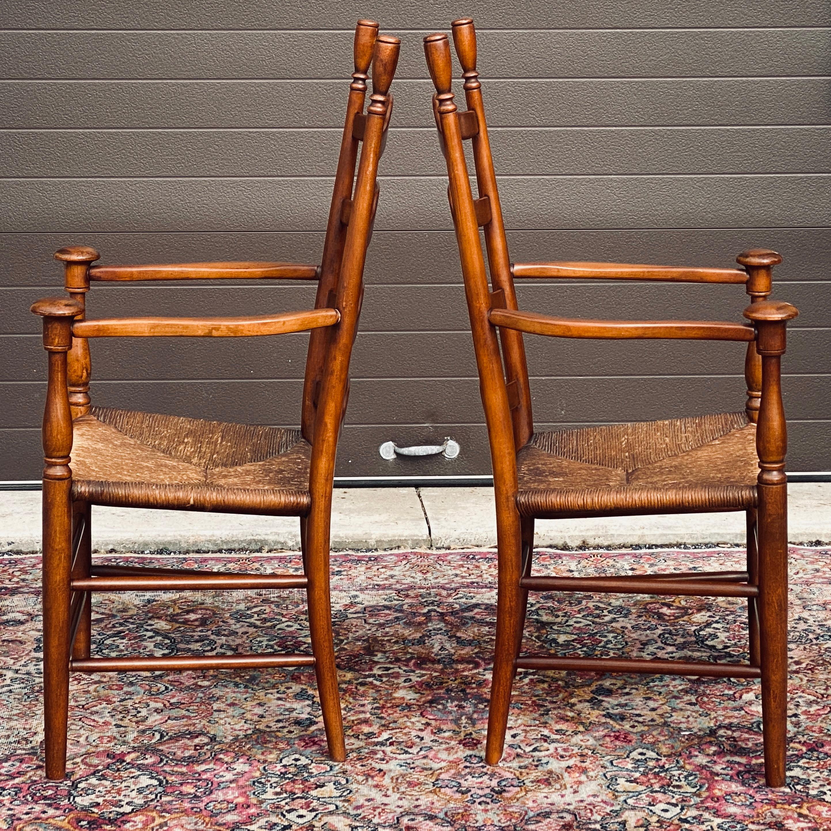 Mid-Century Ladder Back Rush Seat Mushroom Cap Farmhouse Arm Chairs - a Pair In Good Condition In West Chester, PA