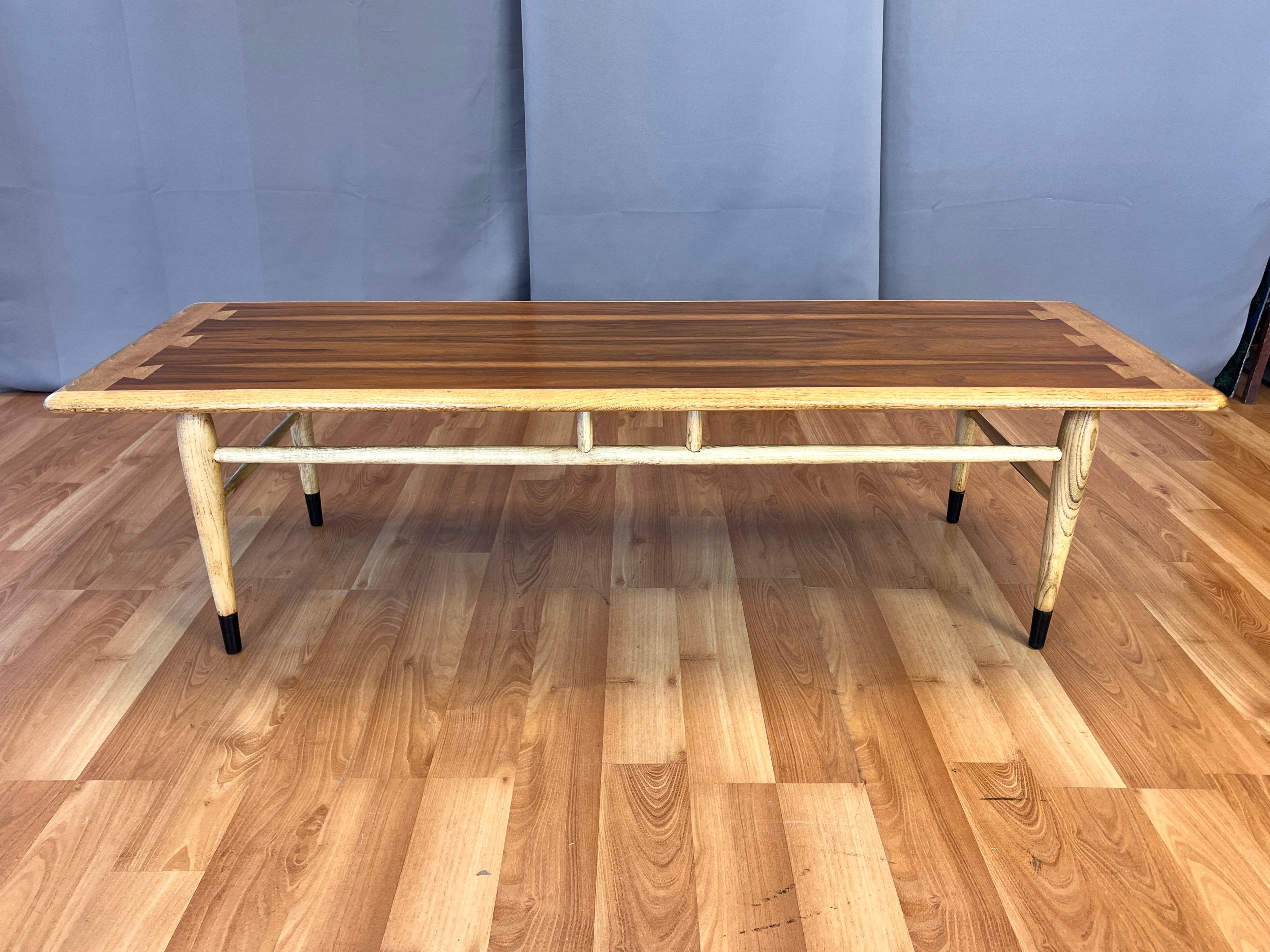 A 1967 Lane Acclaim No. 900-01 cocktail table or coffee table by Dutch designer Andre Bus.

A timeless classic from the iconic mid-century modern furniture collection that launched in 1958. It’s one of the first pieces designed and produced for the