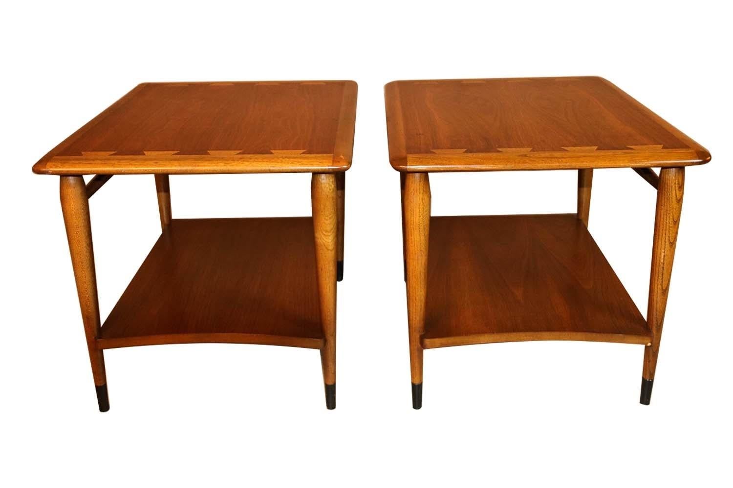 A beautiful pair of end tables by Lane Furniture Co. from the Lane ‘Acclaim’ collection, designed by Andre Bus. Remains in good condition throughout. Featuring stunning, signature dovetailed design, in a vivid contrast against the surface with