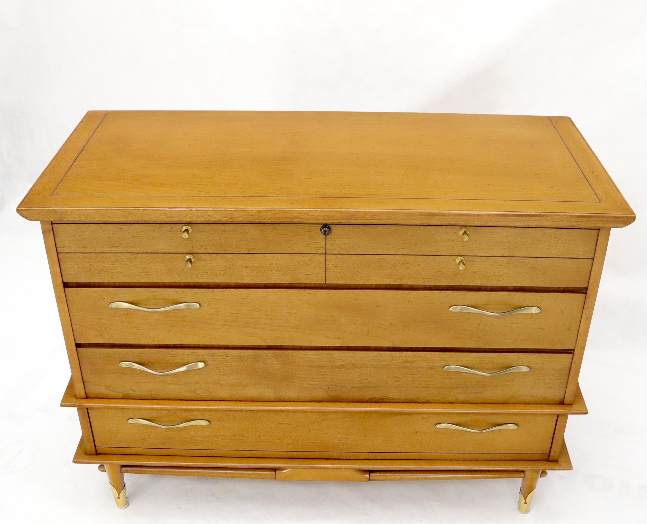 Mid-Century Modern light walnut tall cedar hope chest dresser by Lane. Very clean original condition figural metal legs tips connected with bullet shape stretches.
