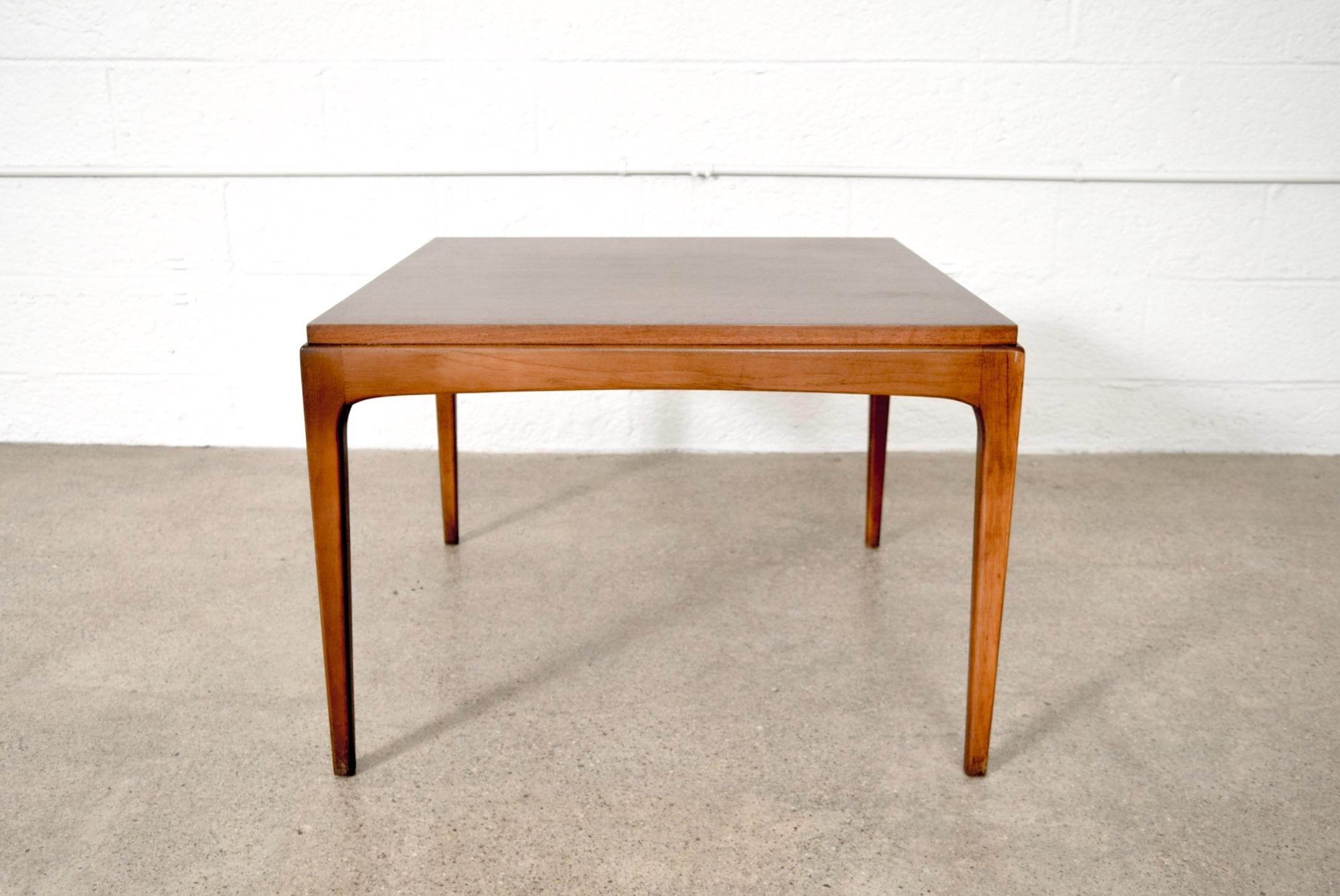 • Vintage Mid-Century Modern lane coffee table from 1962.
• Simple, geometric lines and sleek low profile.
• Well constructed from walnut with beautiful inlaid tabletop edge and squared tapered legs.
 
Marked on underside:
Lane 
Altavista,