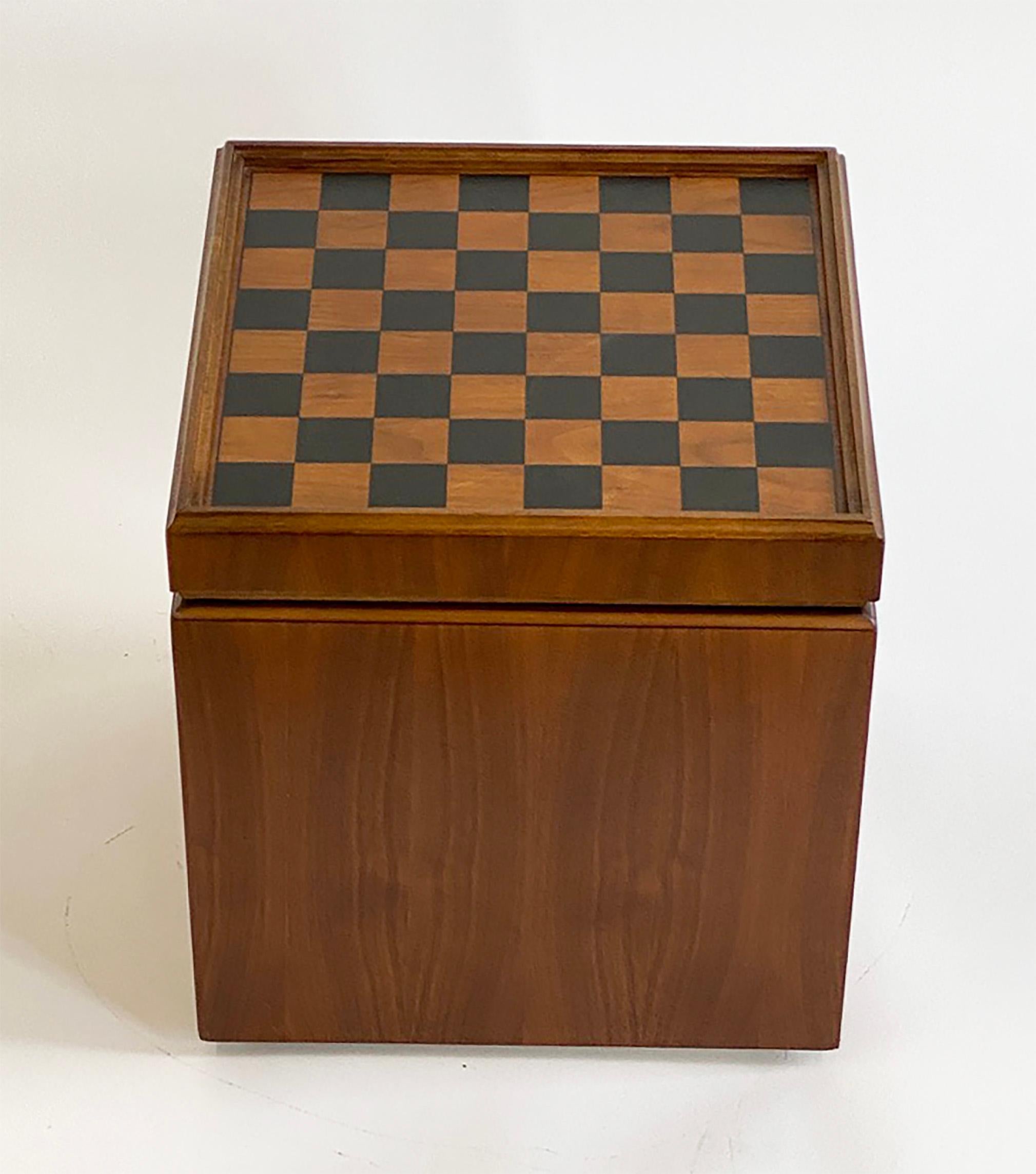 Here is a snappy, smaller-scaled piece of furniture. It's an ottoman. It's a storage cube. It's a side table. It's a chessboard or checkerboard. Manufactured by Lane Furniture in the 1960s, this piece is in very good vintage condition with only a
