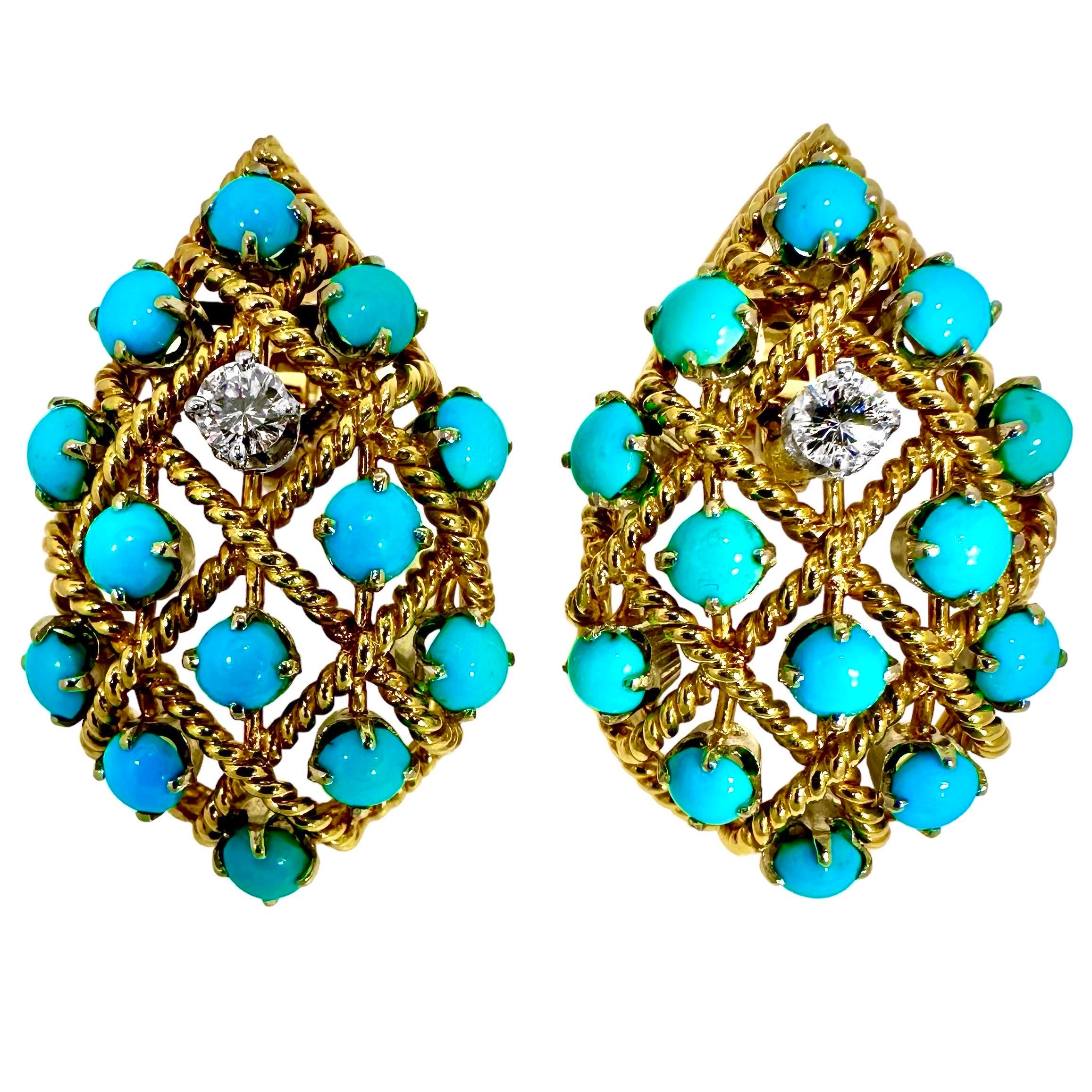 These large, pear shaped, open lattice work design earrings were hand crafted in 18K yellow gold. They are delicate in appearance yet sizable enough to make a statement. Great for daytime wear or into the evening. Twenty six turquoise cabochons are