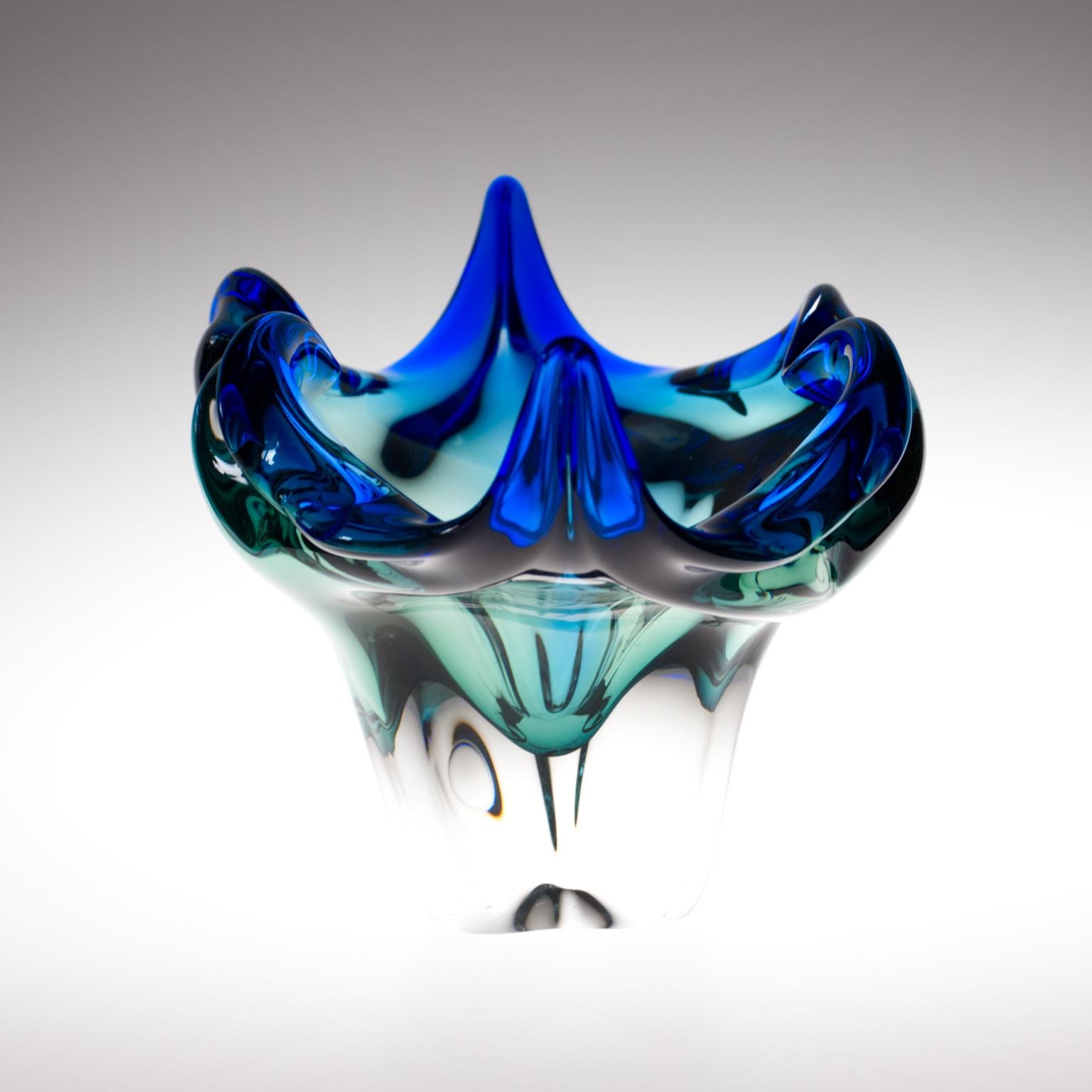 This highly sculptural winged bowl was designed by the talented Josef Hospodka for the Chribska Glassworks in 1960s. During his time as chief designer at Chribska.

The Chribska Glassworks has a celebrated history dating back to the 15th century.