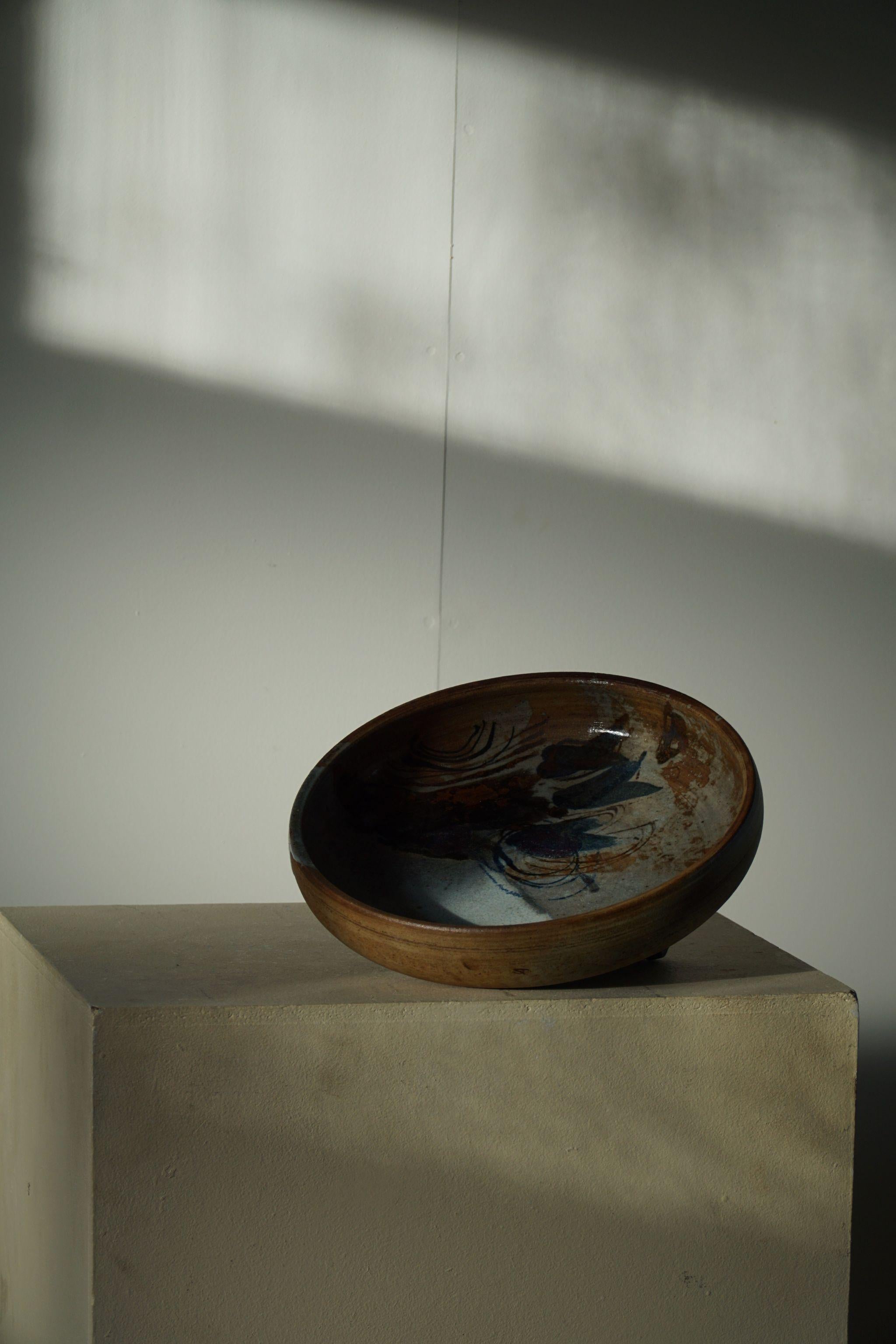 Beautiful large stoneware bowl by Danish artist Conny Walther. Made in 1970s.
Great colour plate in this glaze.

Other mentionable ceramic artists from Denmark: Arne Bang, Axel Salto & Gertrud Vasegaard.