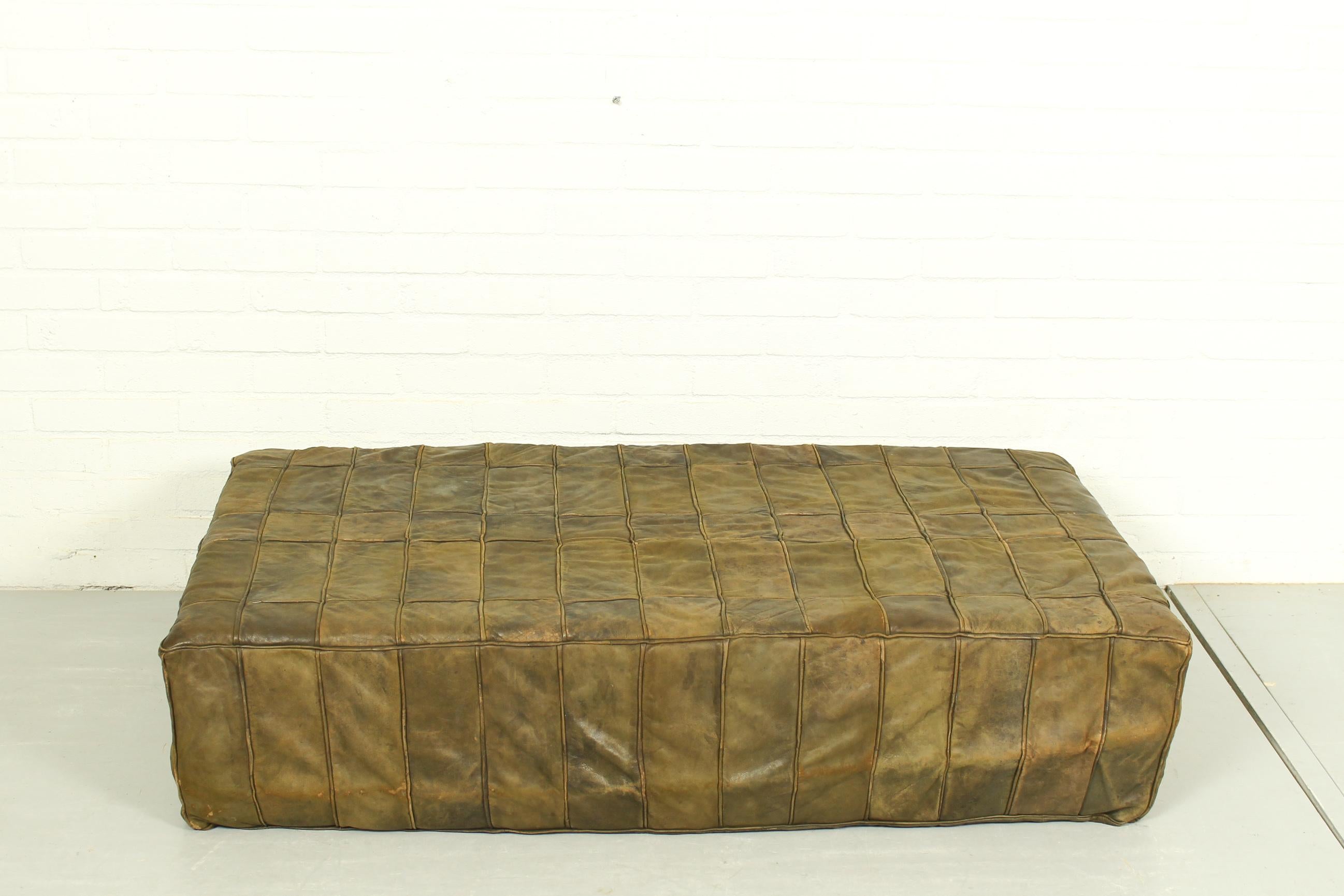 Mid Century Large Brown Patchwork Leather Foot Stool In Fair Condition For Sale In Appeltern, Gelderland